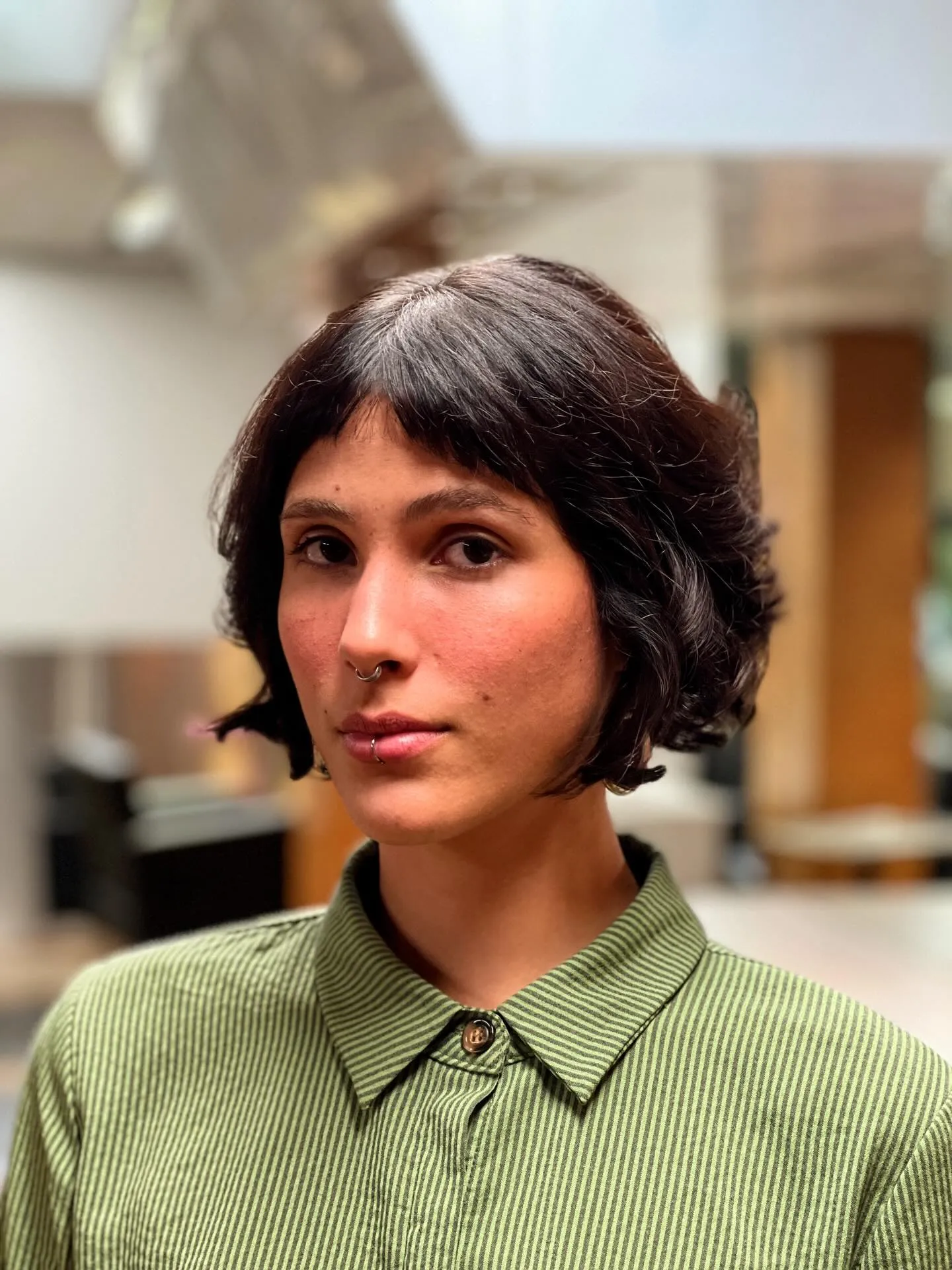 Rounded jaw-length bob with short curtain fringe