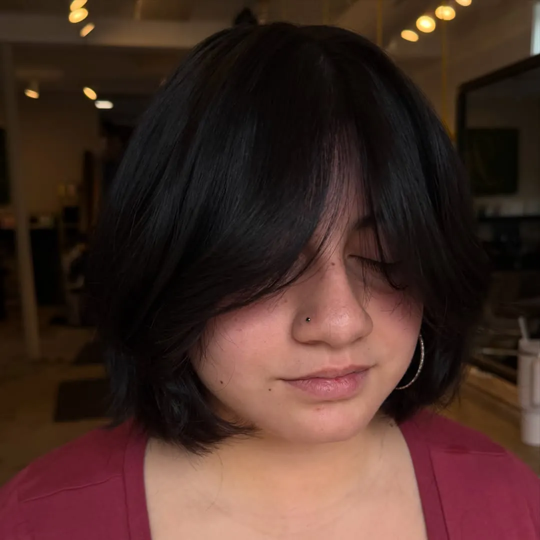 Rounded layered bob with long eye-skimming bangs