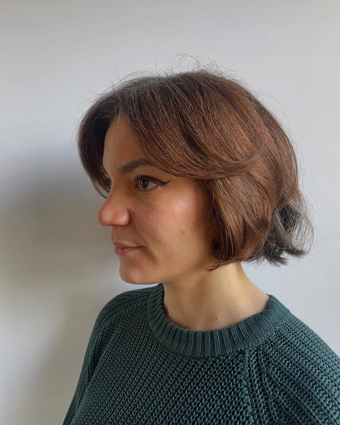 Rounded layered bob with long curtain bangs