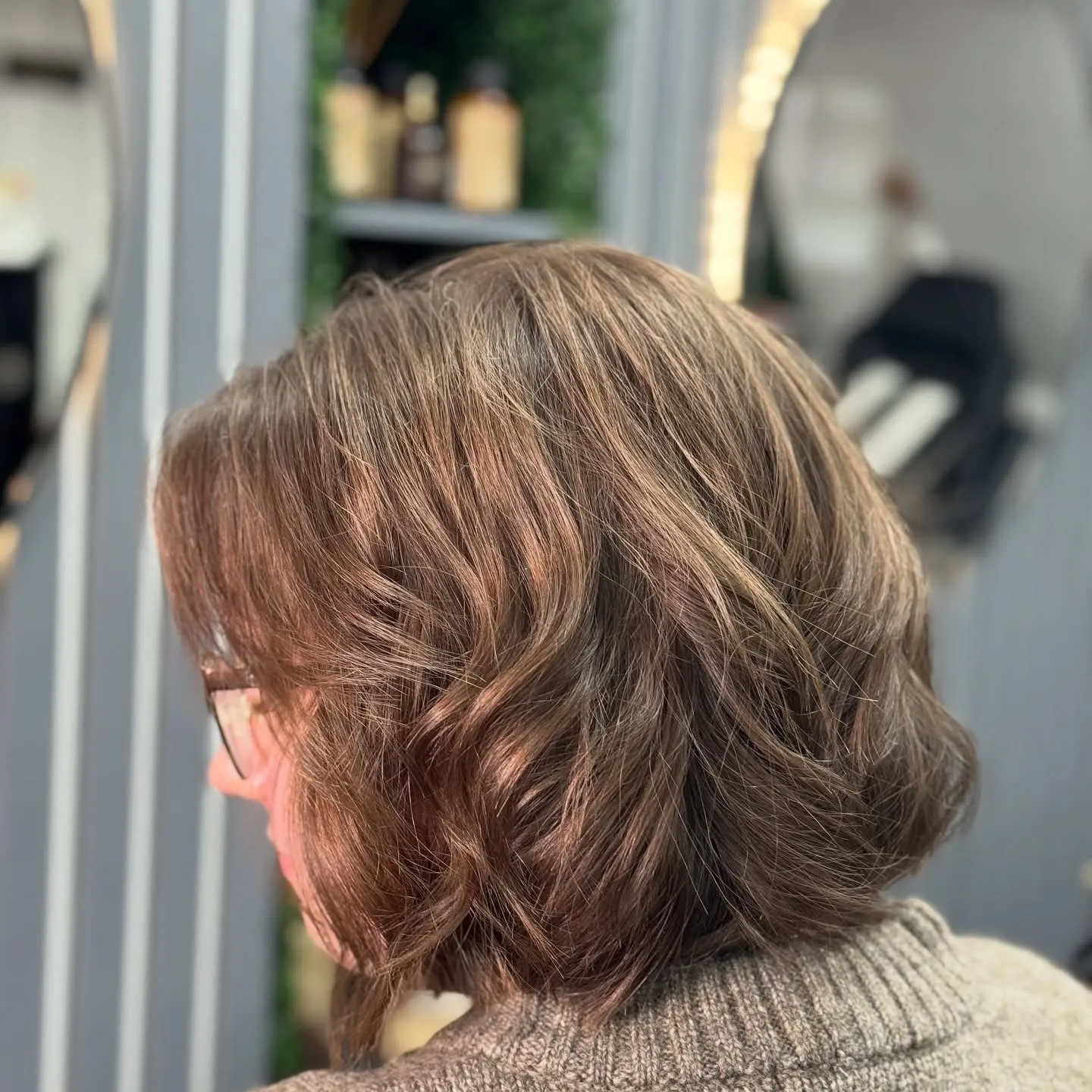 Soft wavy layered bob with blended side bangs