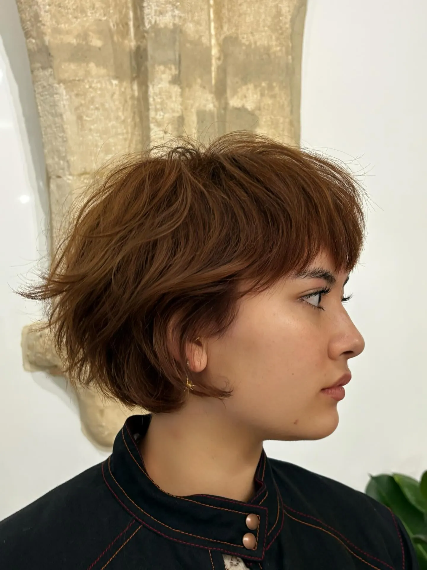 Choppy layered bob with short fringe and tousled ends