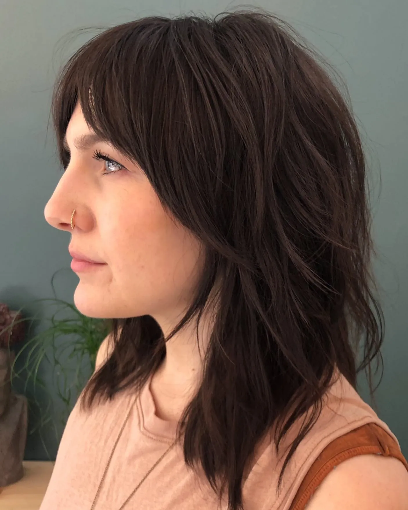 Shoulder-length dark shag with textured ends