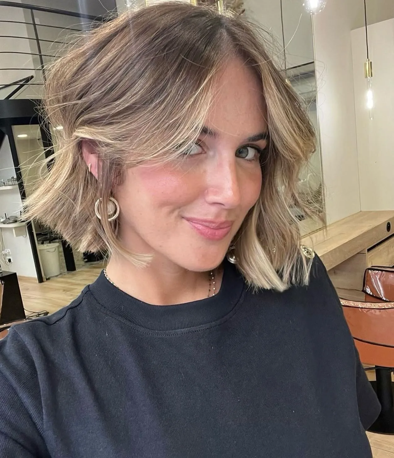Tousled light blonde bob with curtain fringe