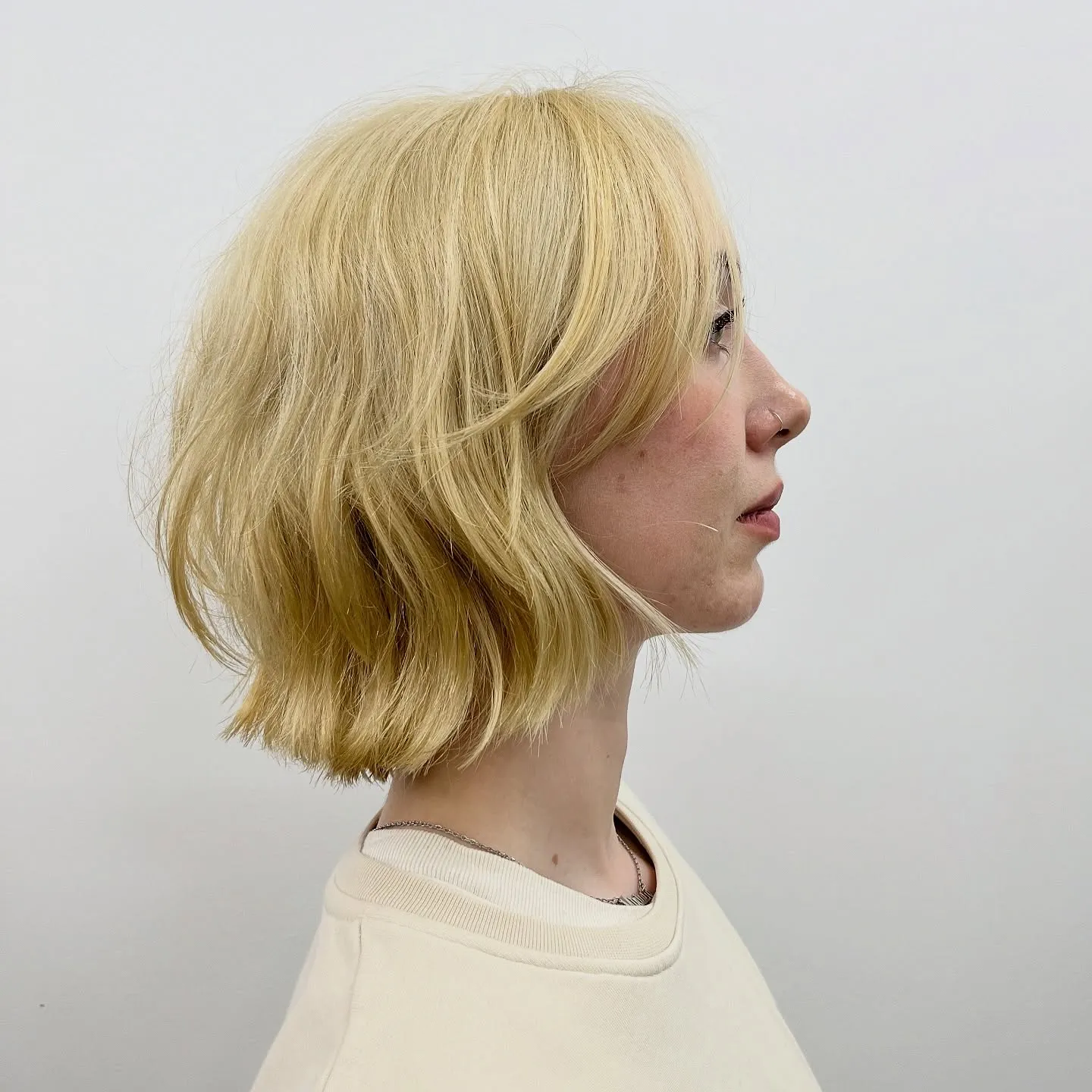 Softly curved light blonde bob