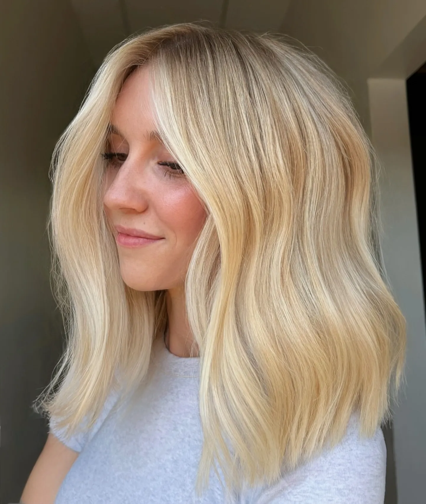 Natural light blonde lob with loose texture
