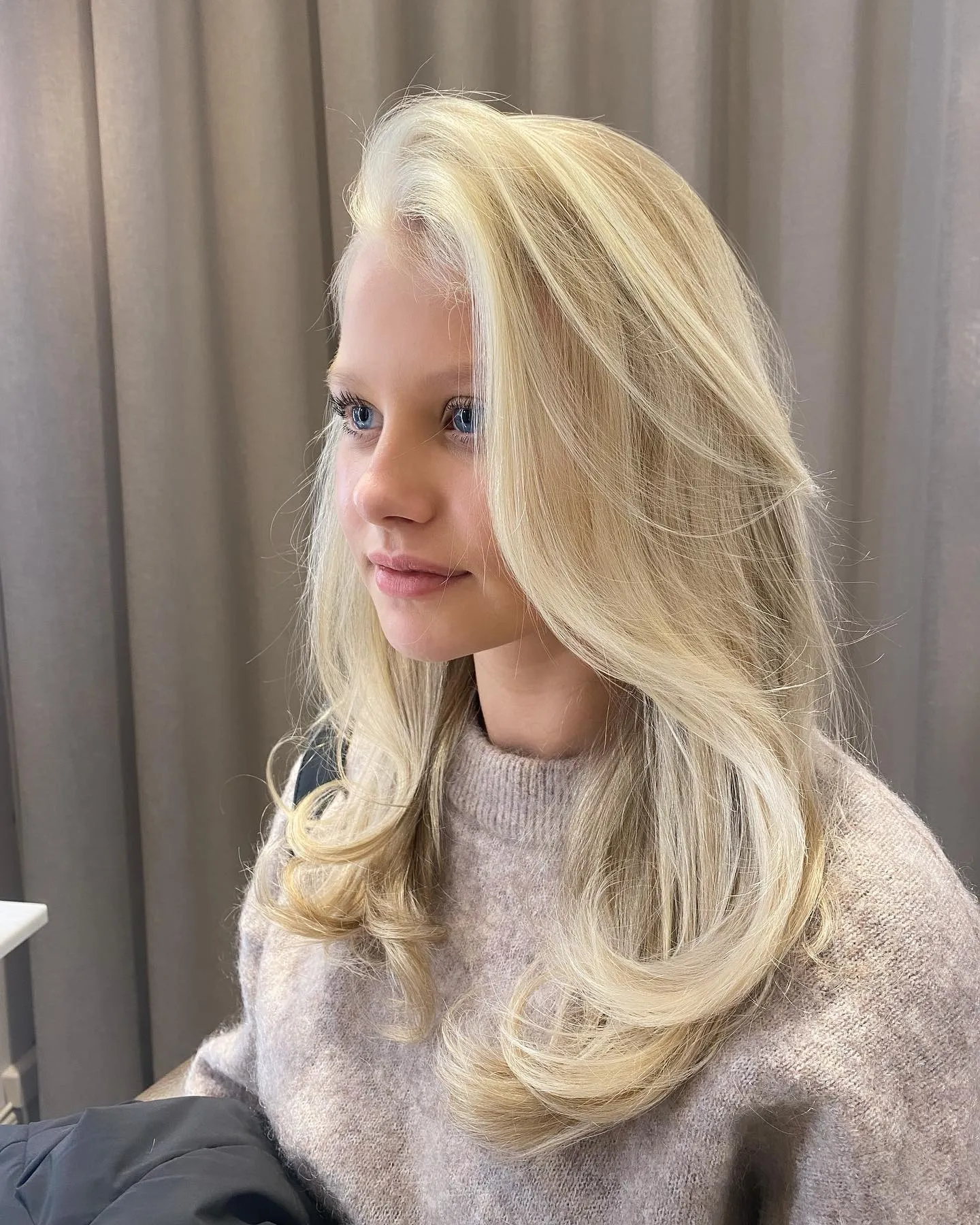 Long light blonde layers with sweeping front