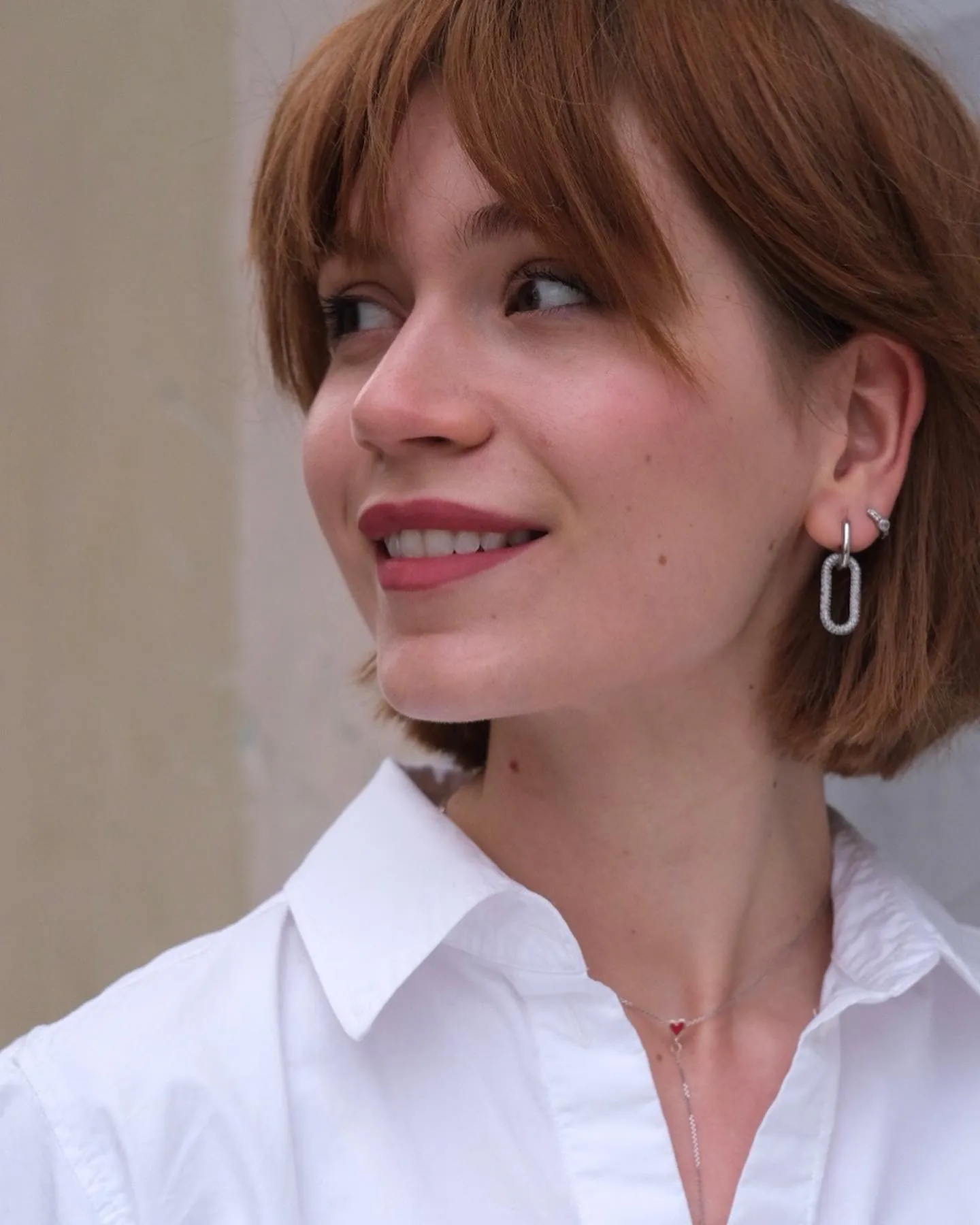 Auburn bixie with curtain fringe and jaw-length sides