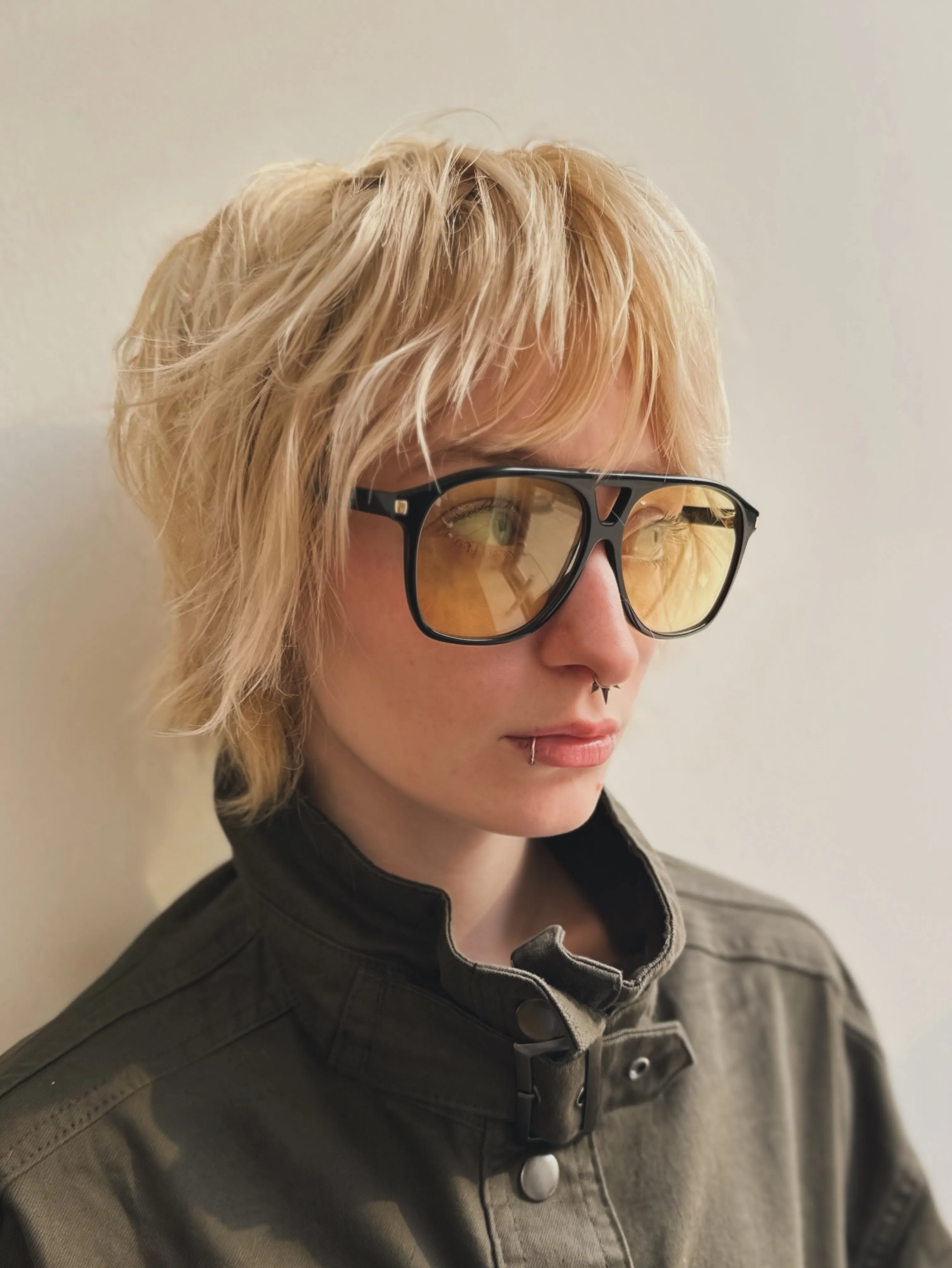 Choppy blonde shag bixie with broken fringe and textured layers