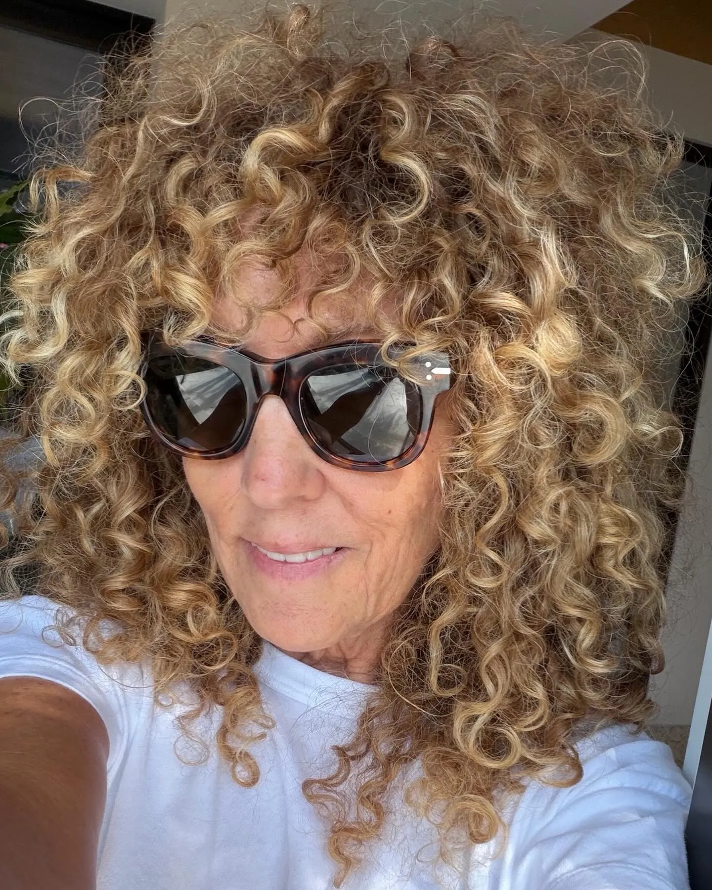 Defined long curly layers with springy ringlets