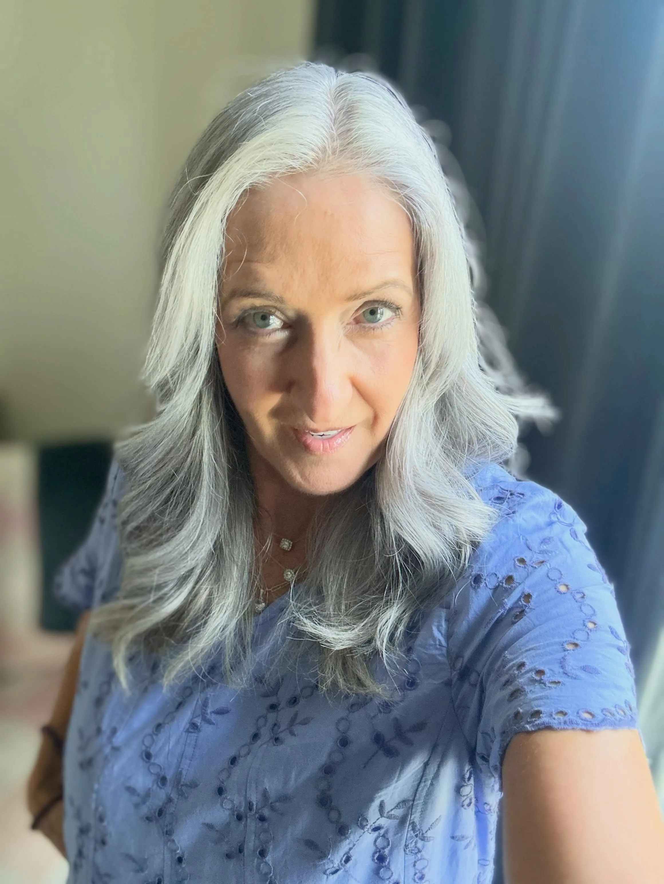 Soft long silver waves with a center part