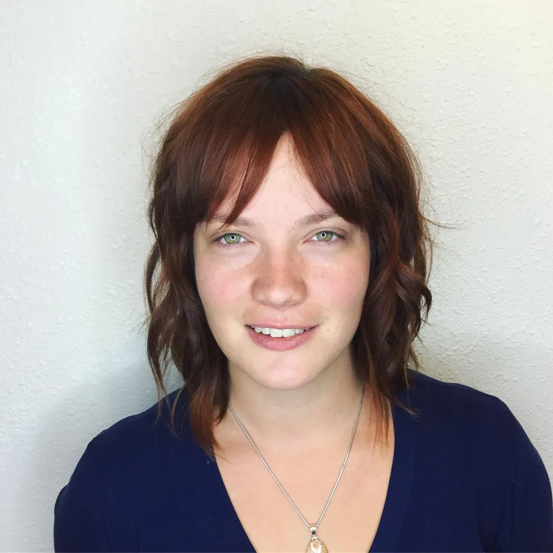 Layered wavy lob with curtain fringe