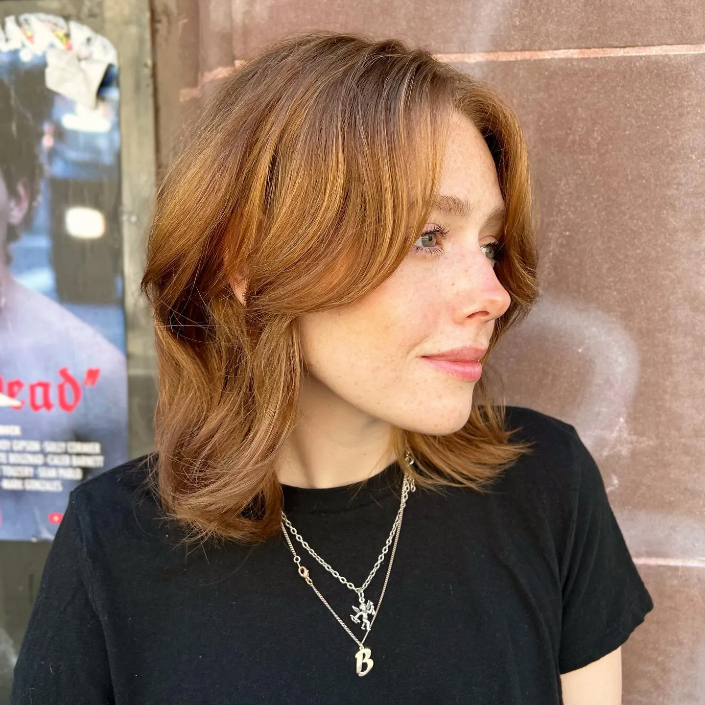Feathered wavy lob with side-swept front