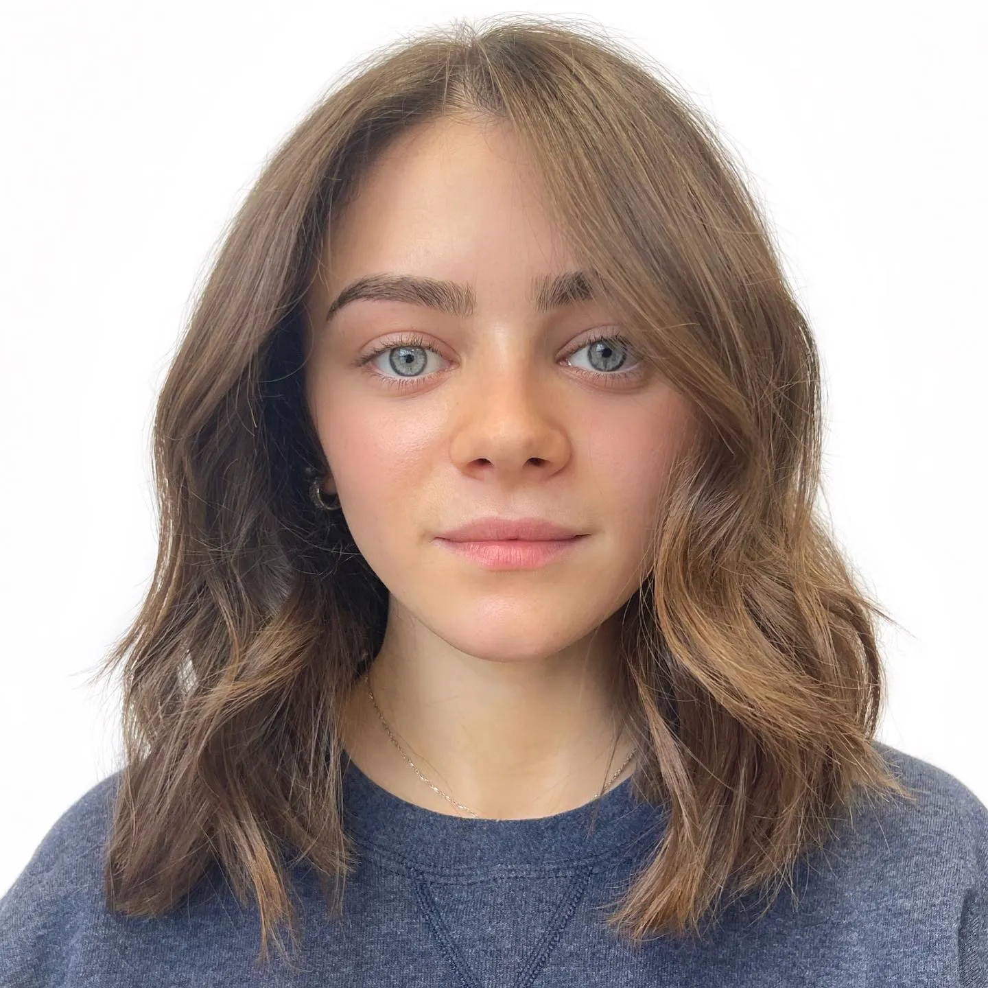 Layered wavy lob with long curtain bangs