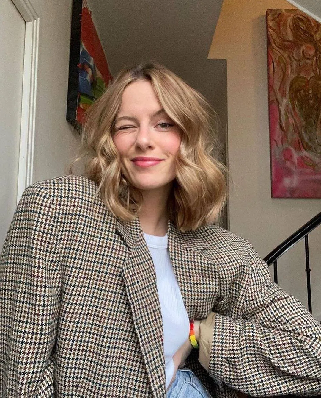 Centre-parted long bob with polished waves
