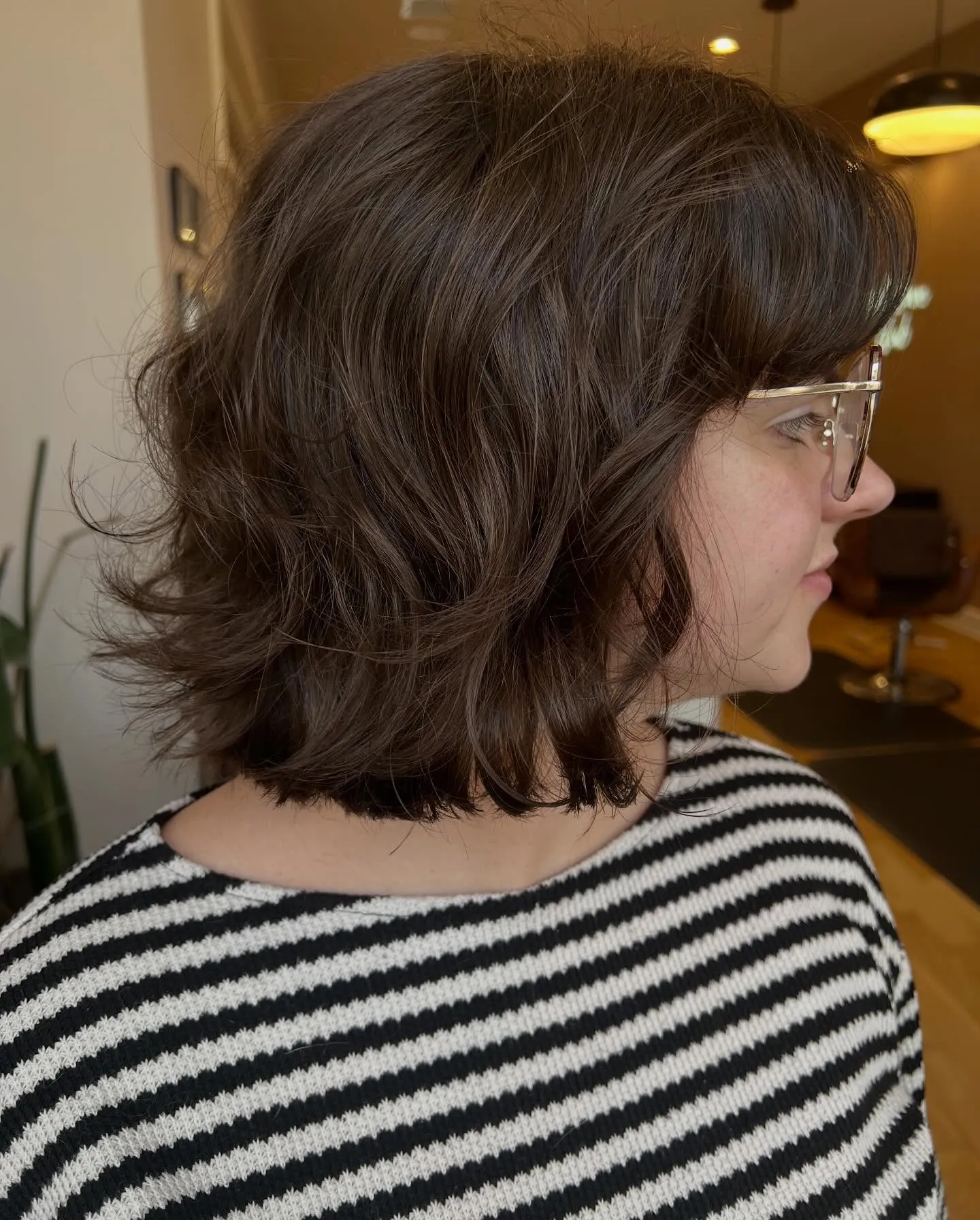 Choppy wavy lob with brow-length fringe
