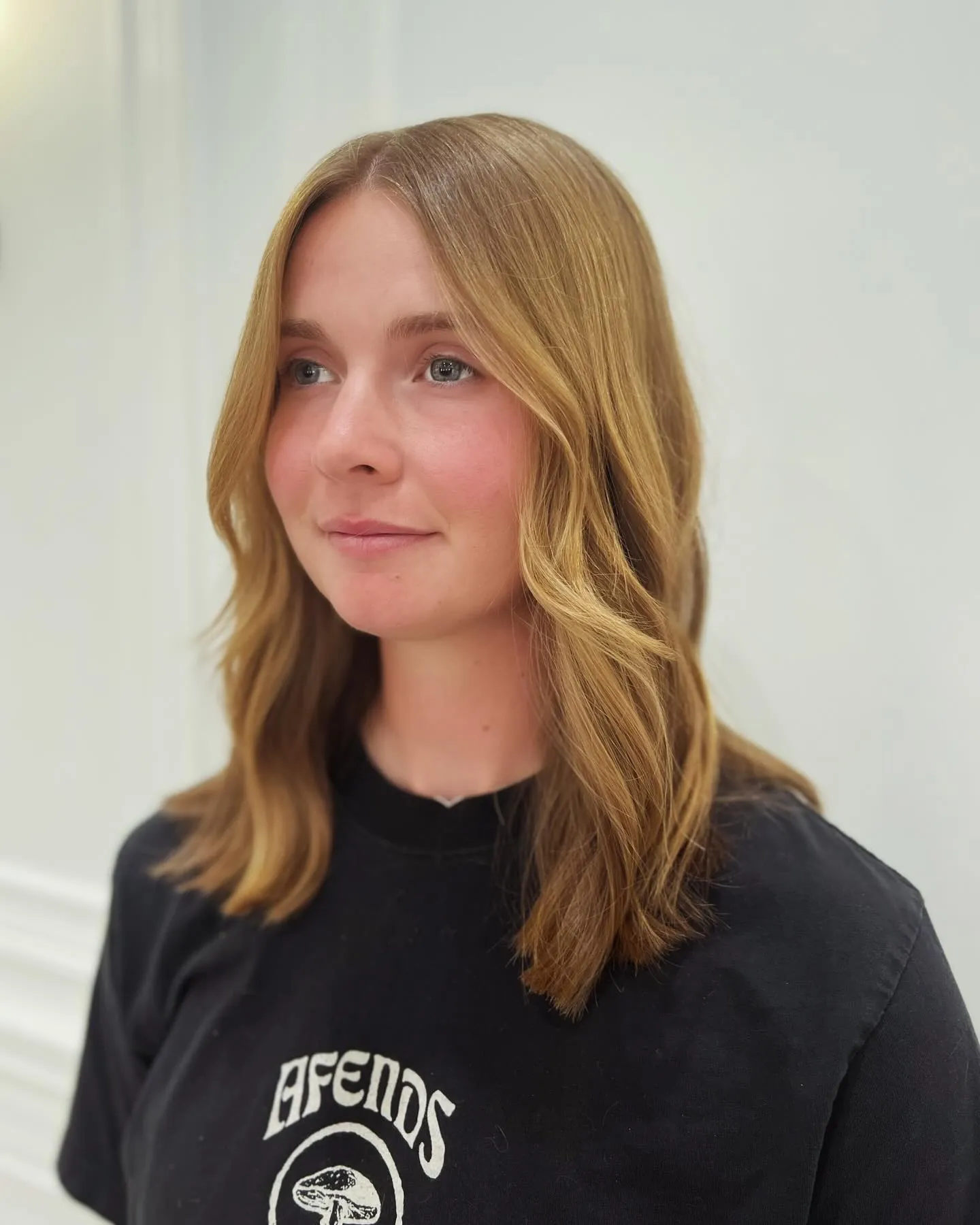 Soft center-part shoulder-length lob with turned ends