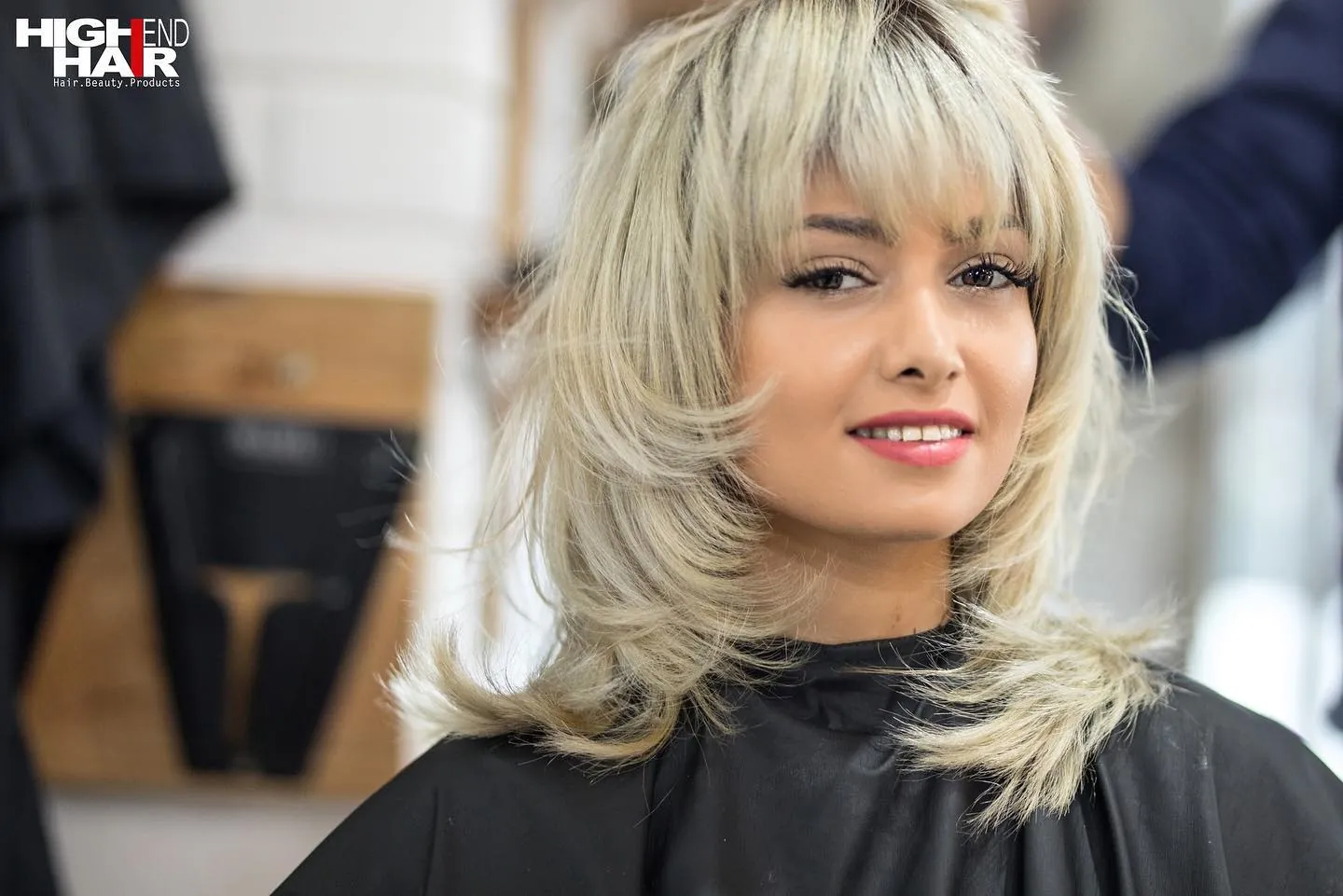 Platinum feathered shag with bangs and flipped layers