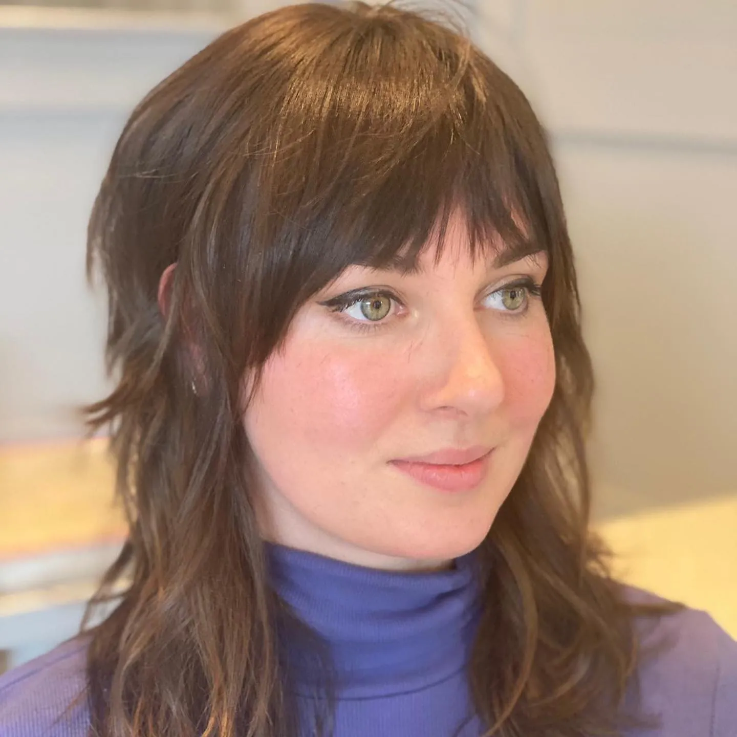 Soft brunette shag with wispy fringe