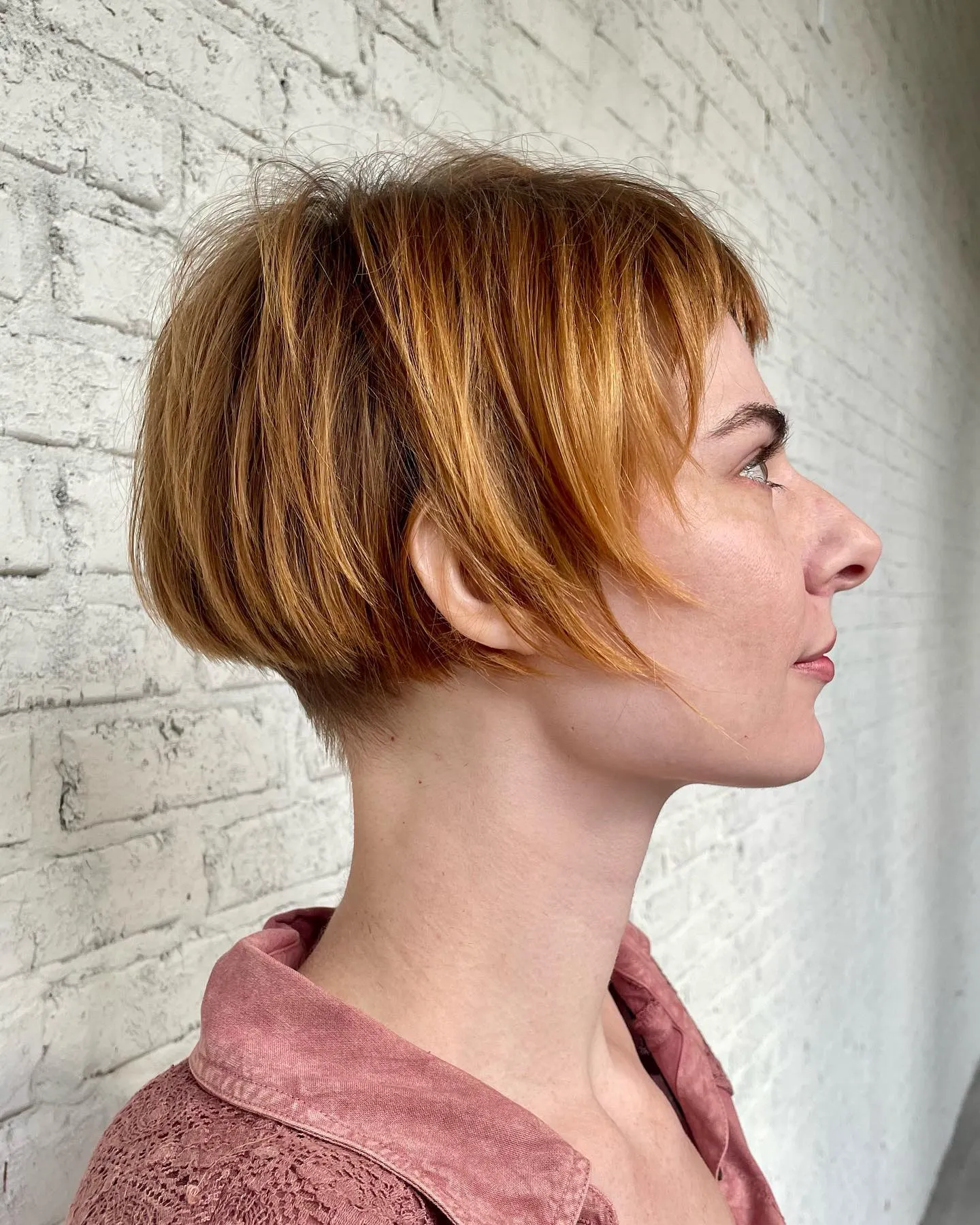 Short copper micro bob with rounded layers and a softly swept front