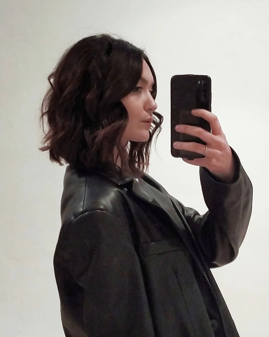 Dark tousled bob with loose uneven waves