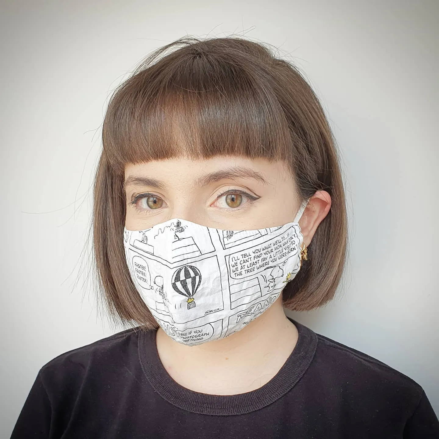 Brown bob with a short blunt micro fringe