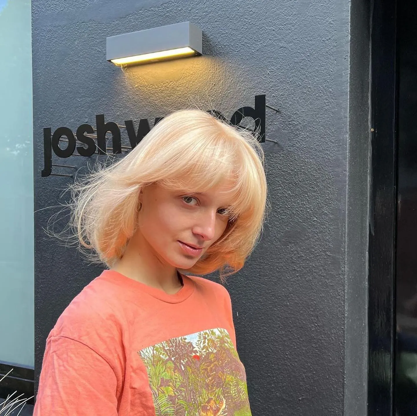 Soft rounded blonde bob with full fringe