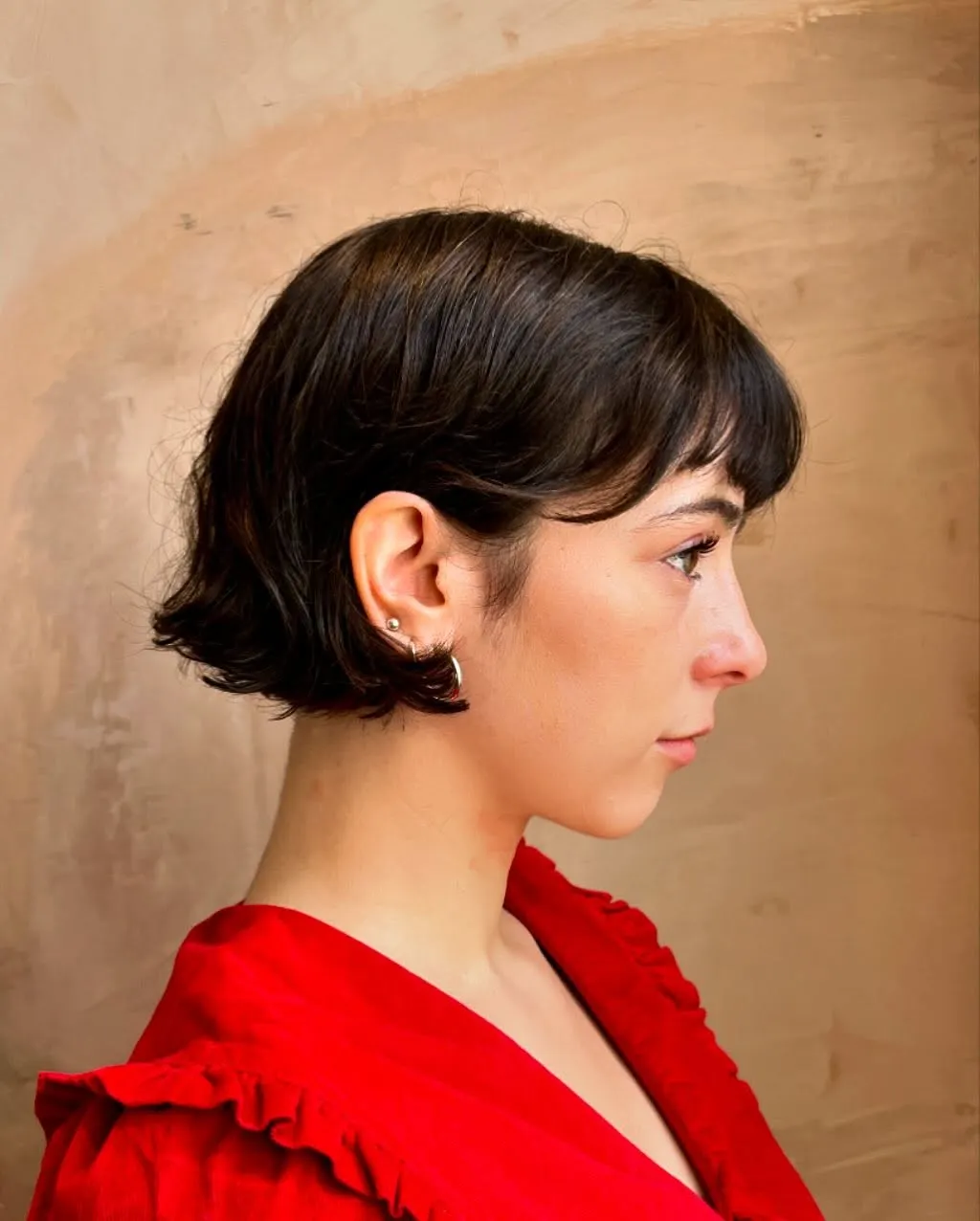 Flipped mini bob with side fringe