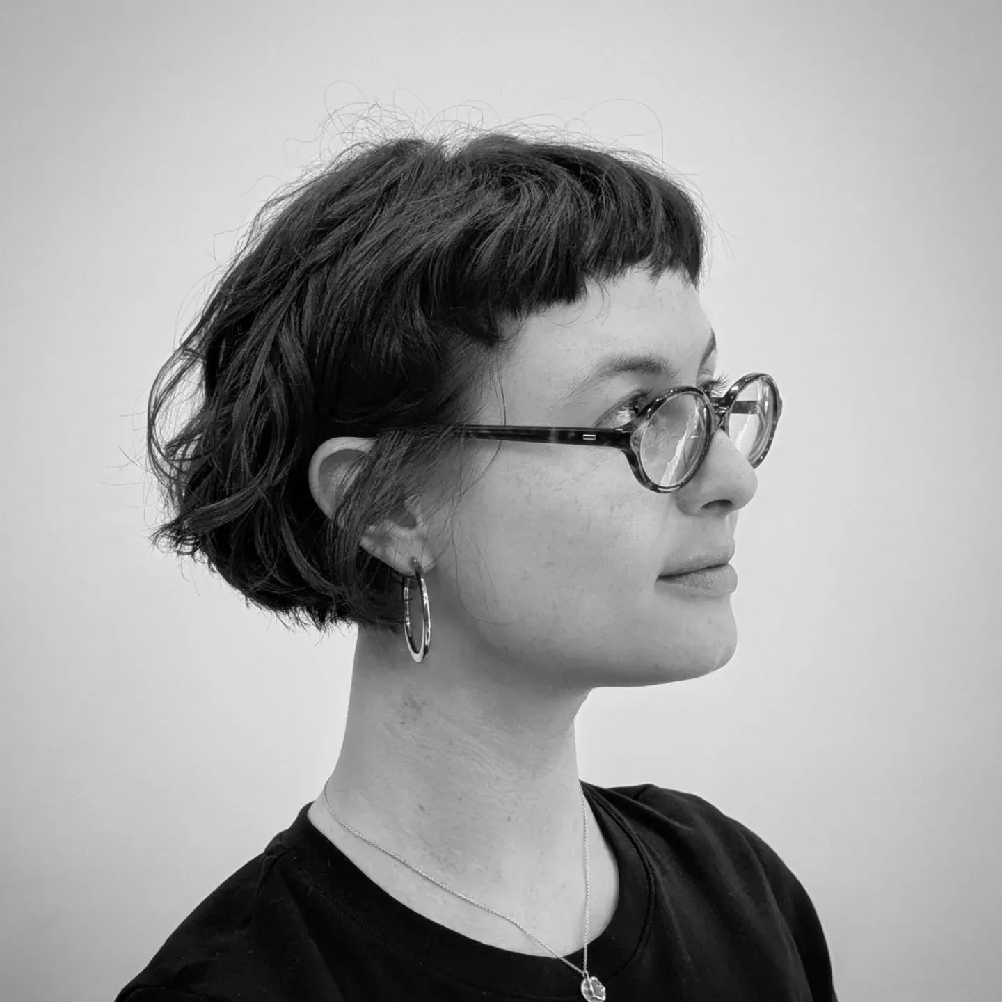 Textured mini bob with undercut side and short fringe