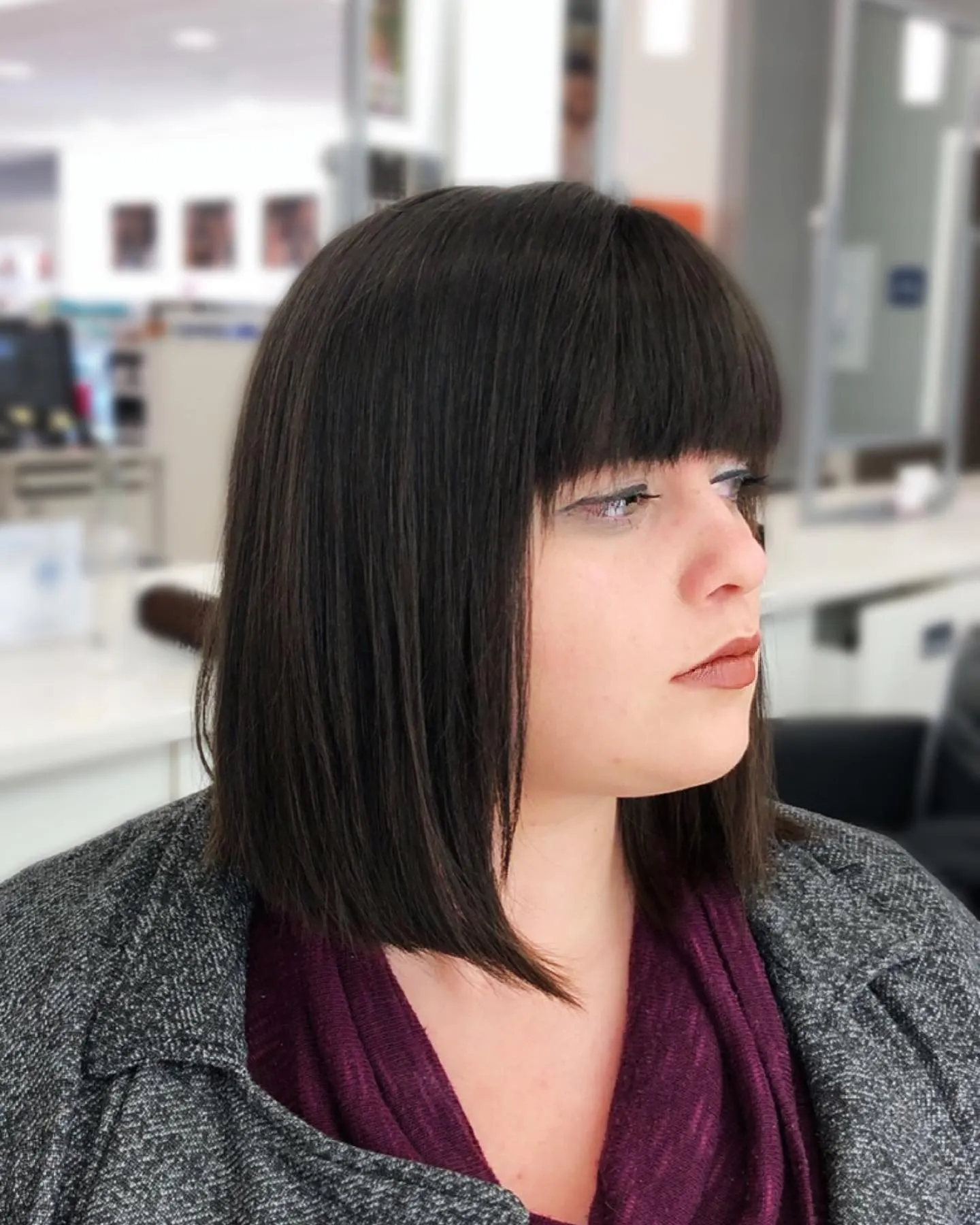 Long pageboy bob with heavy fringe