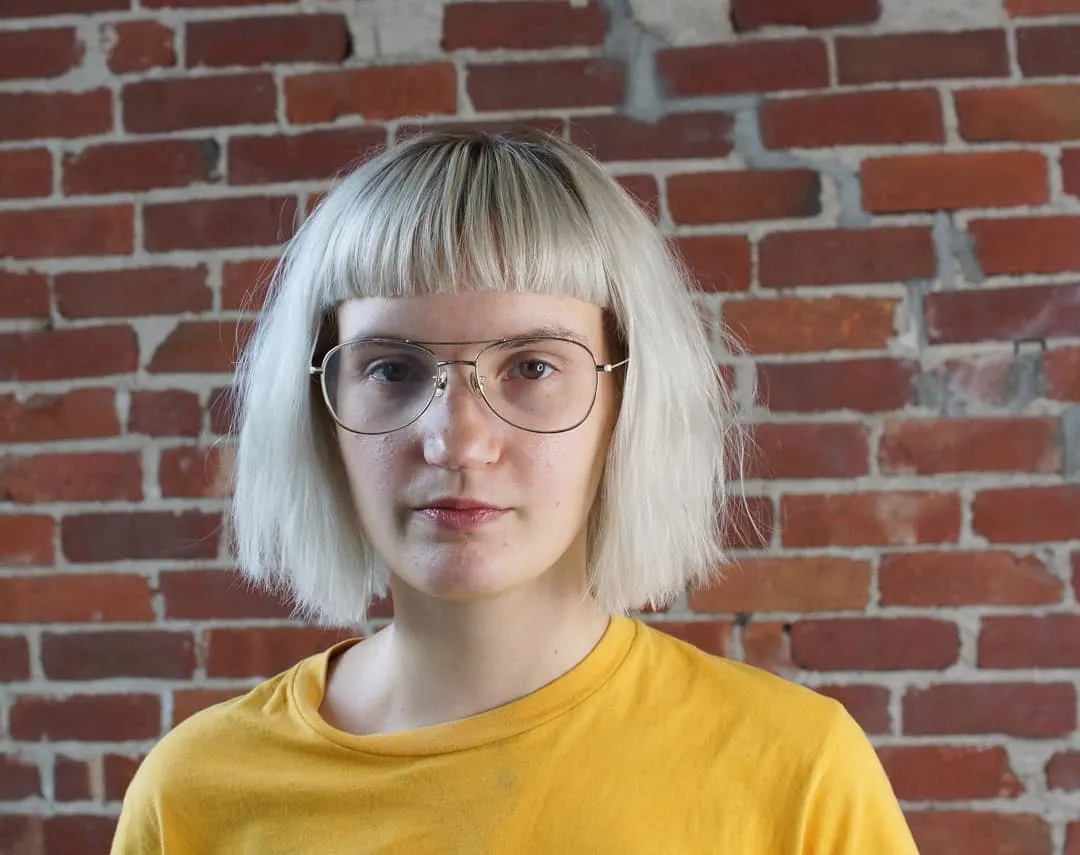 Blunt pageboy bob with short straight fringe
