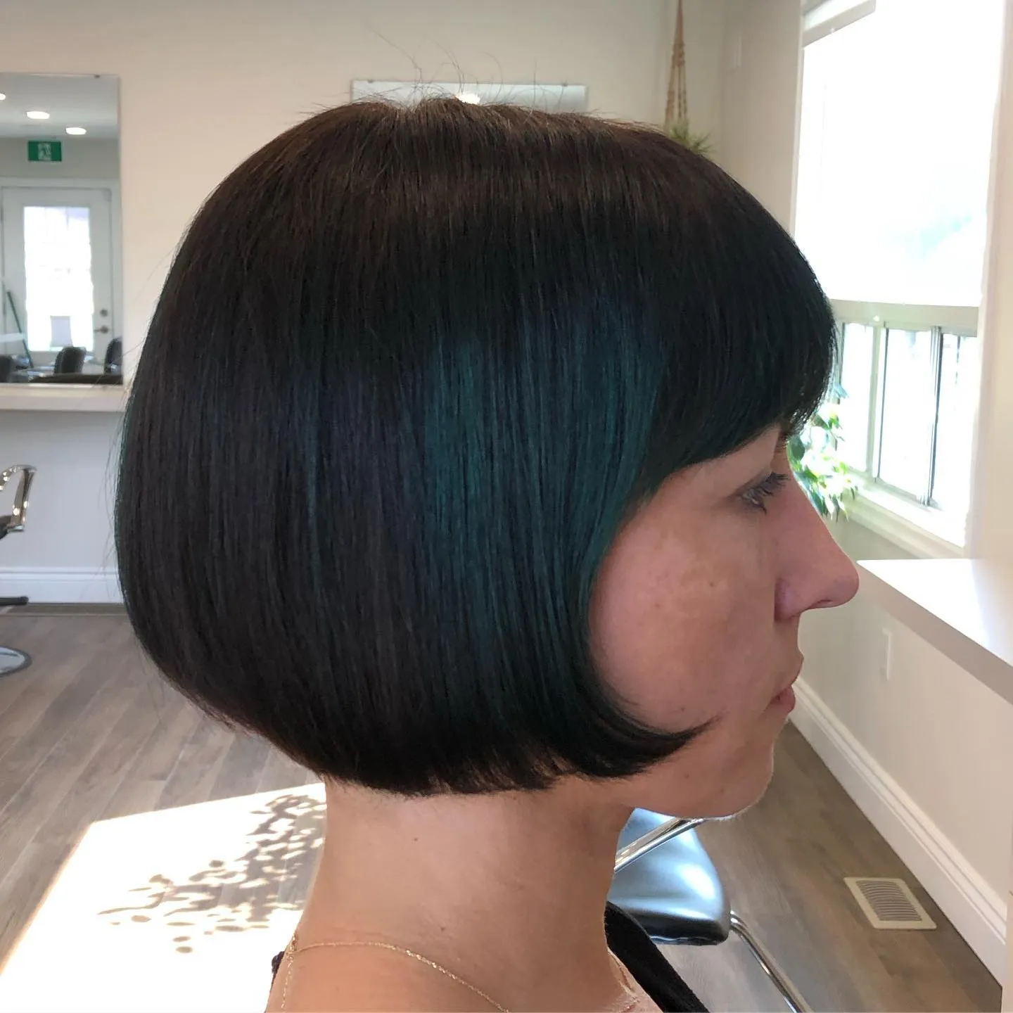 Sleek pageboy bob with side fringe