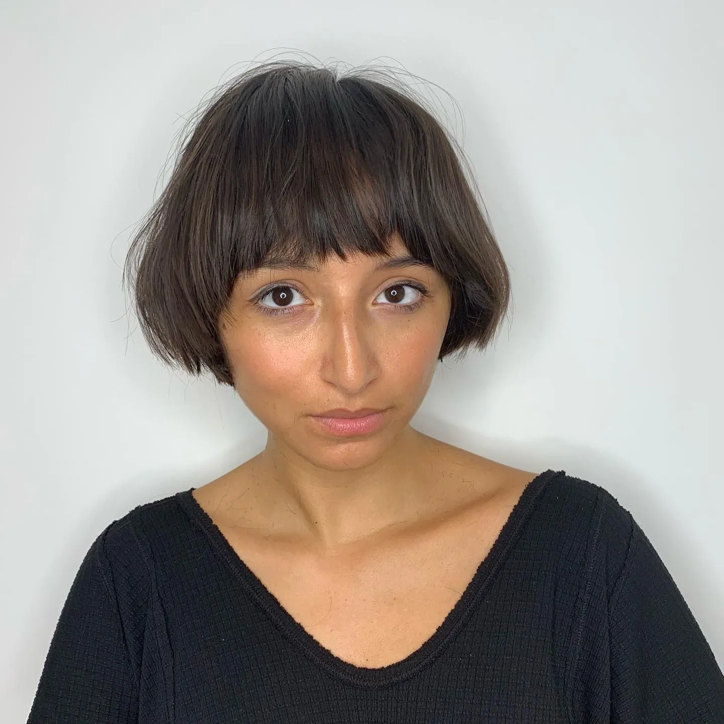 Soft rounded pageboy bob with piecey fringe