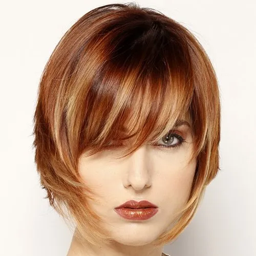 Asymmetrical pageboy haircut with long side fringe