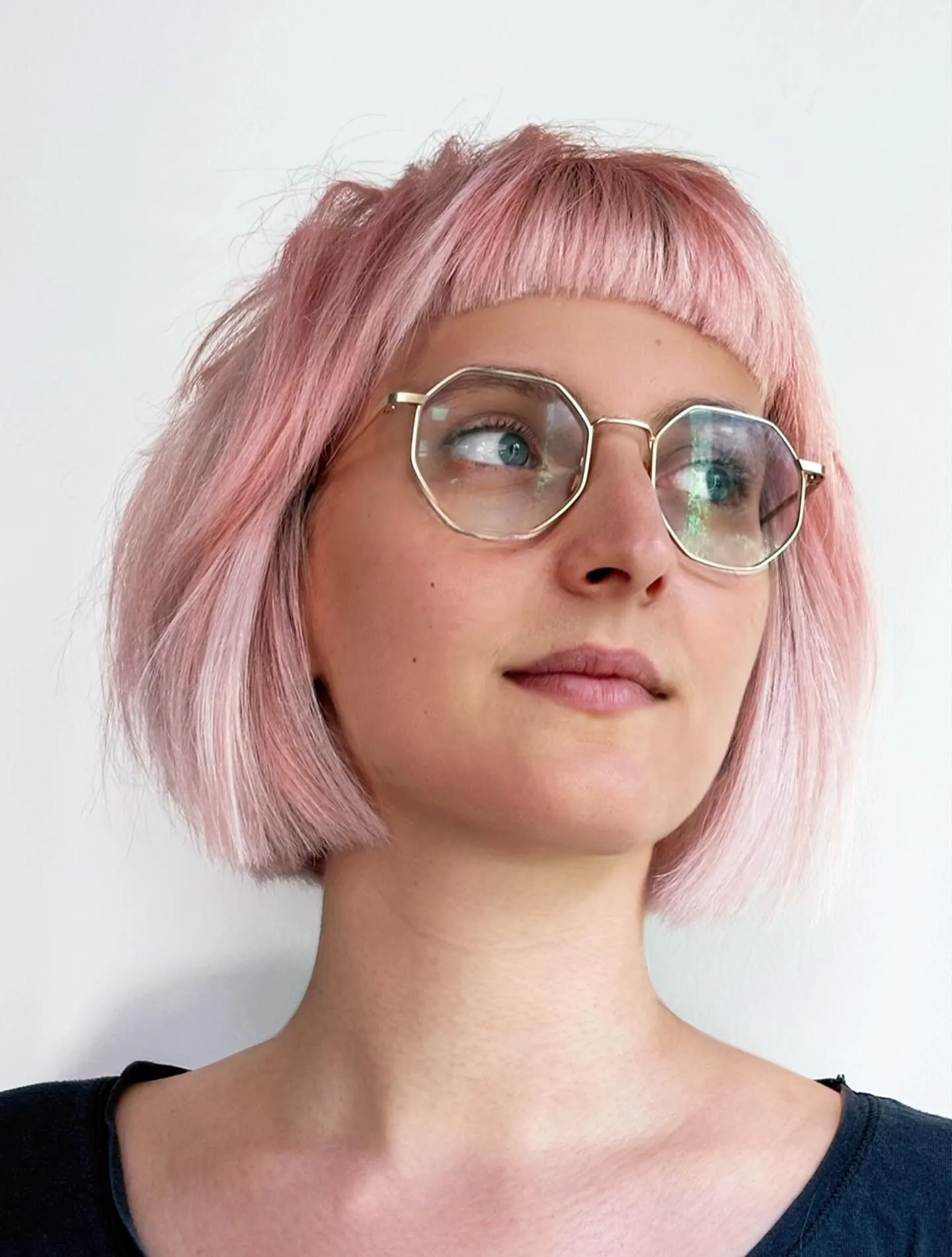 Pale pink blunt bob with short straight fringe