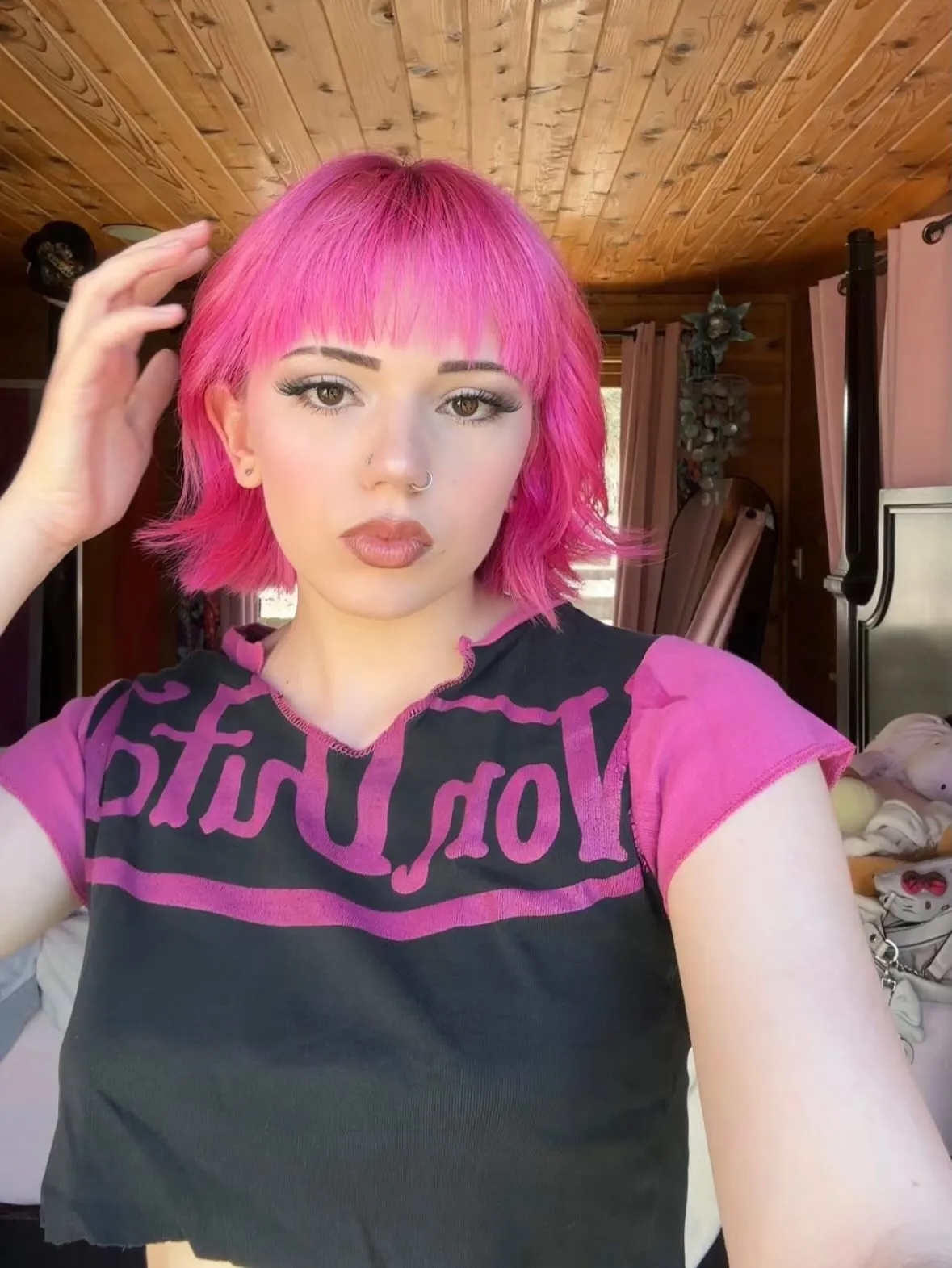 Hot pink bob with short fringe and flipped ends