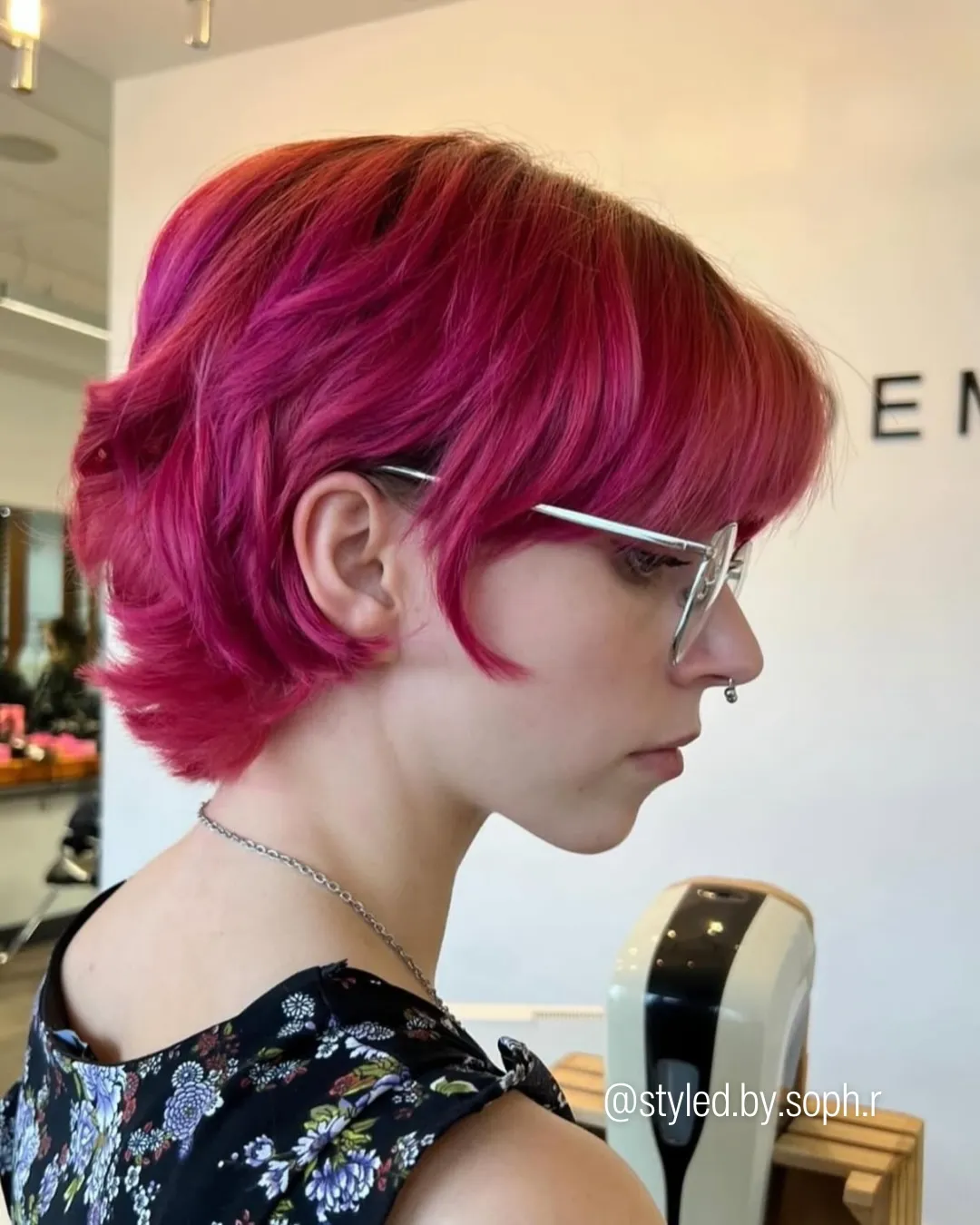 Deep pink layered pixie bob with longer top sections