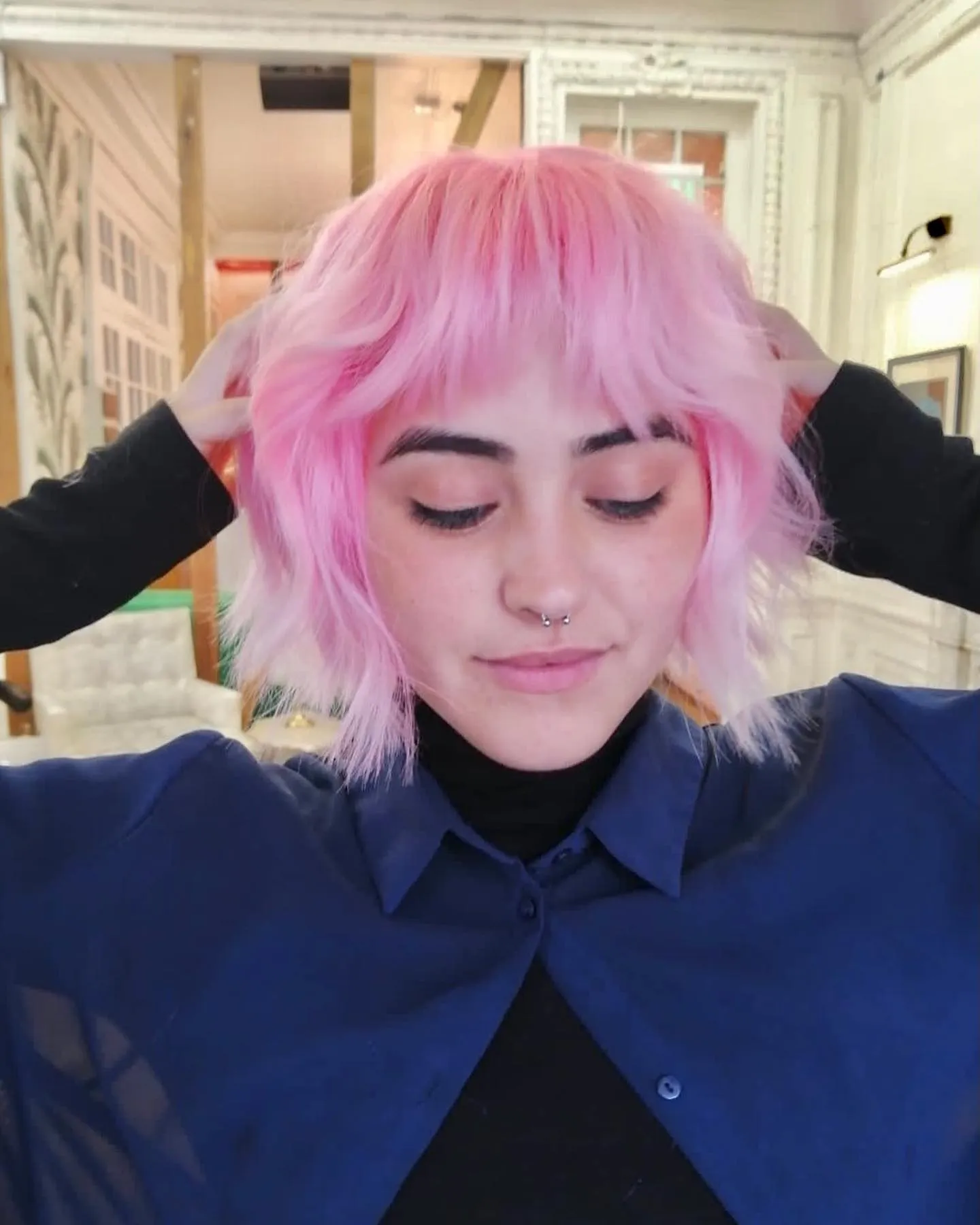 Pastel pink choppy bob with short textured fringe