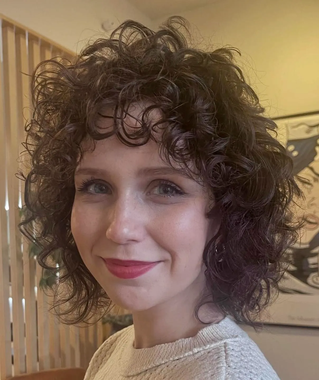 Curly rounded bob with short fringe