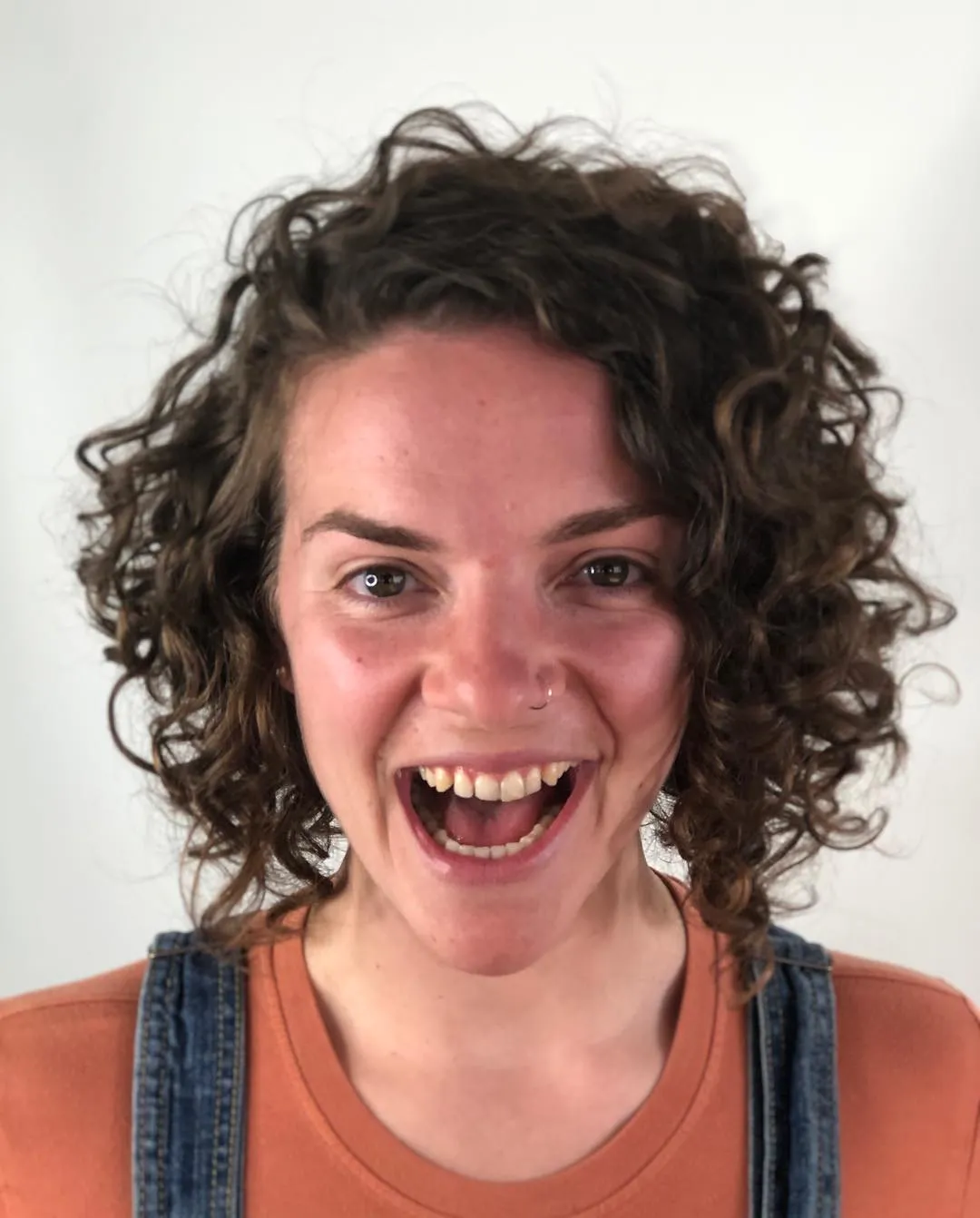 Full curly bob with a rounded shape