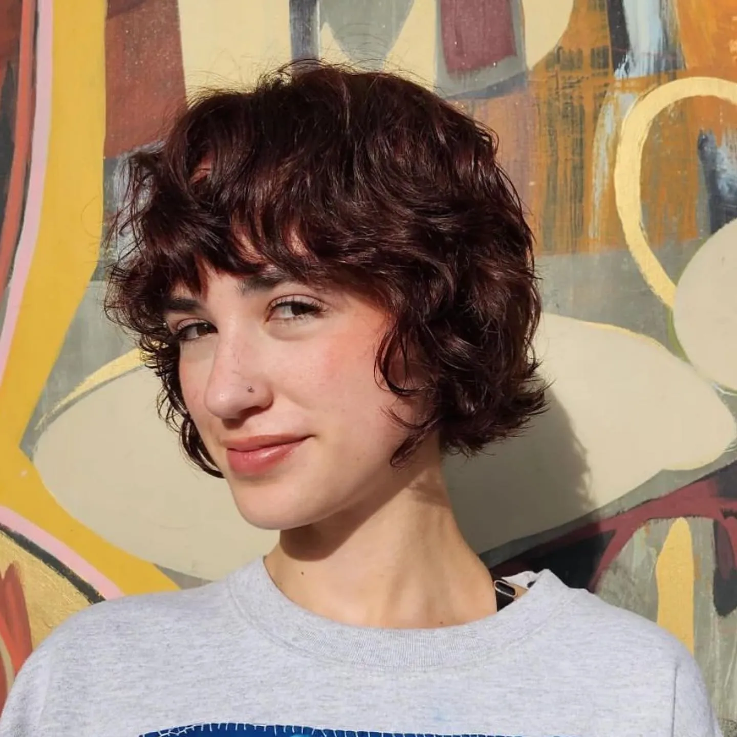 Shaggy rounded bob with sweeping fringe