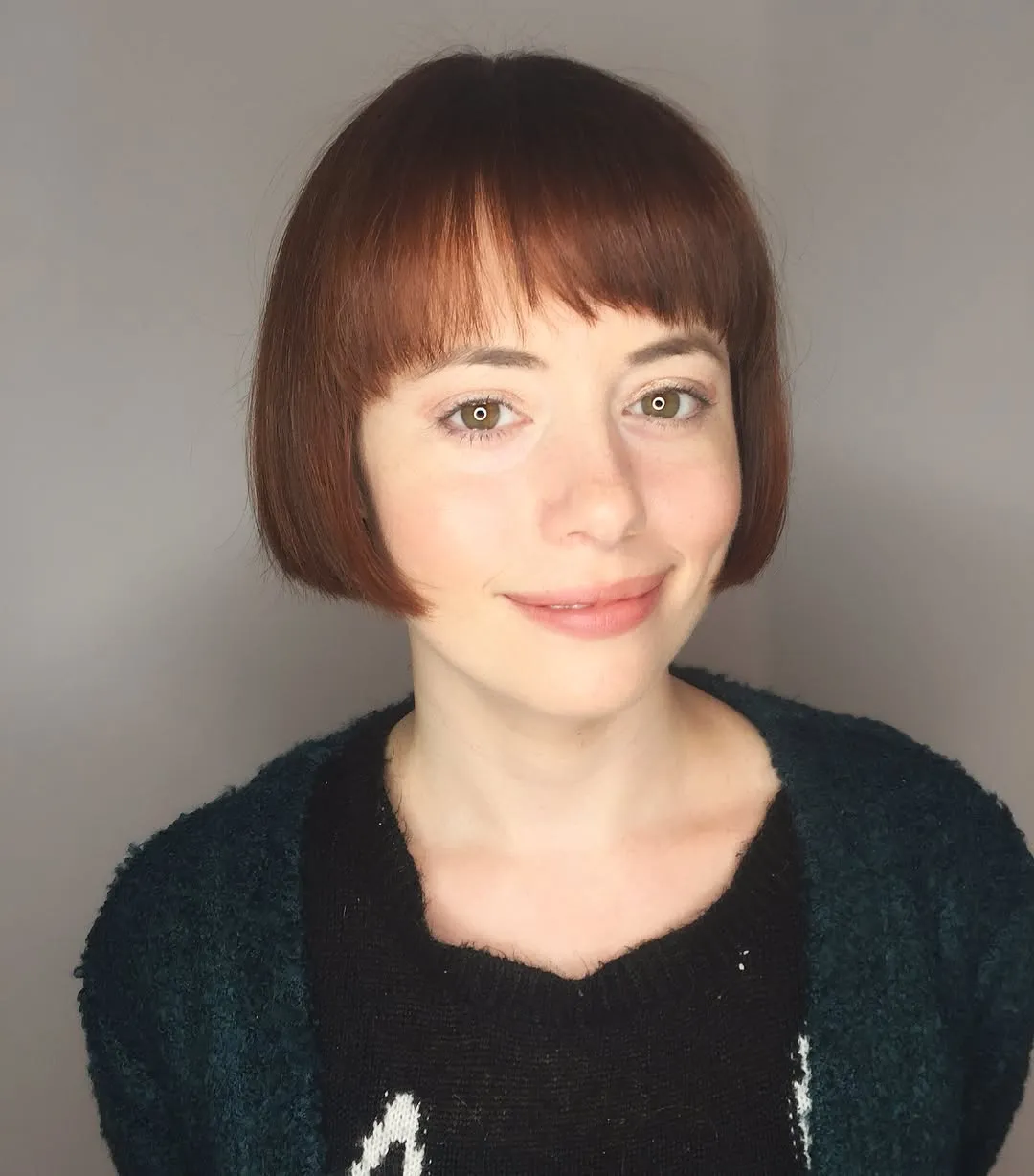 Classic rounded bob with blunt fringe