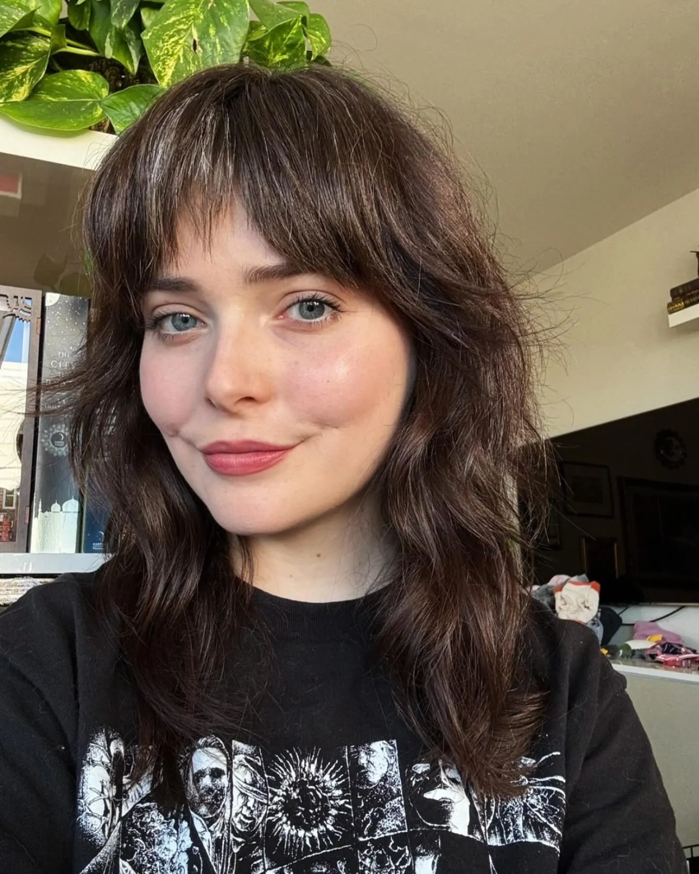 Long wavy shag with wispy fringe and face-framing layers