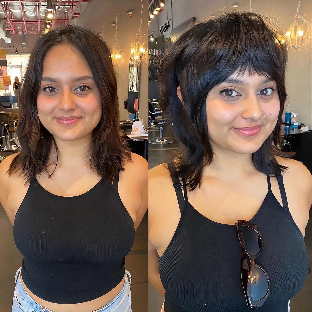 Short wolf shag with piecey fringe and flicked neck-length layers