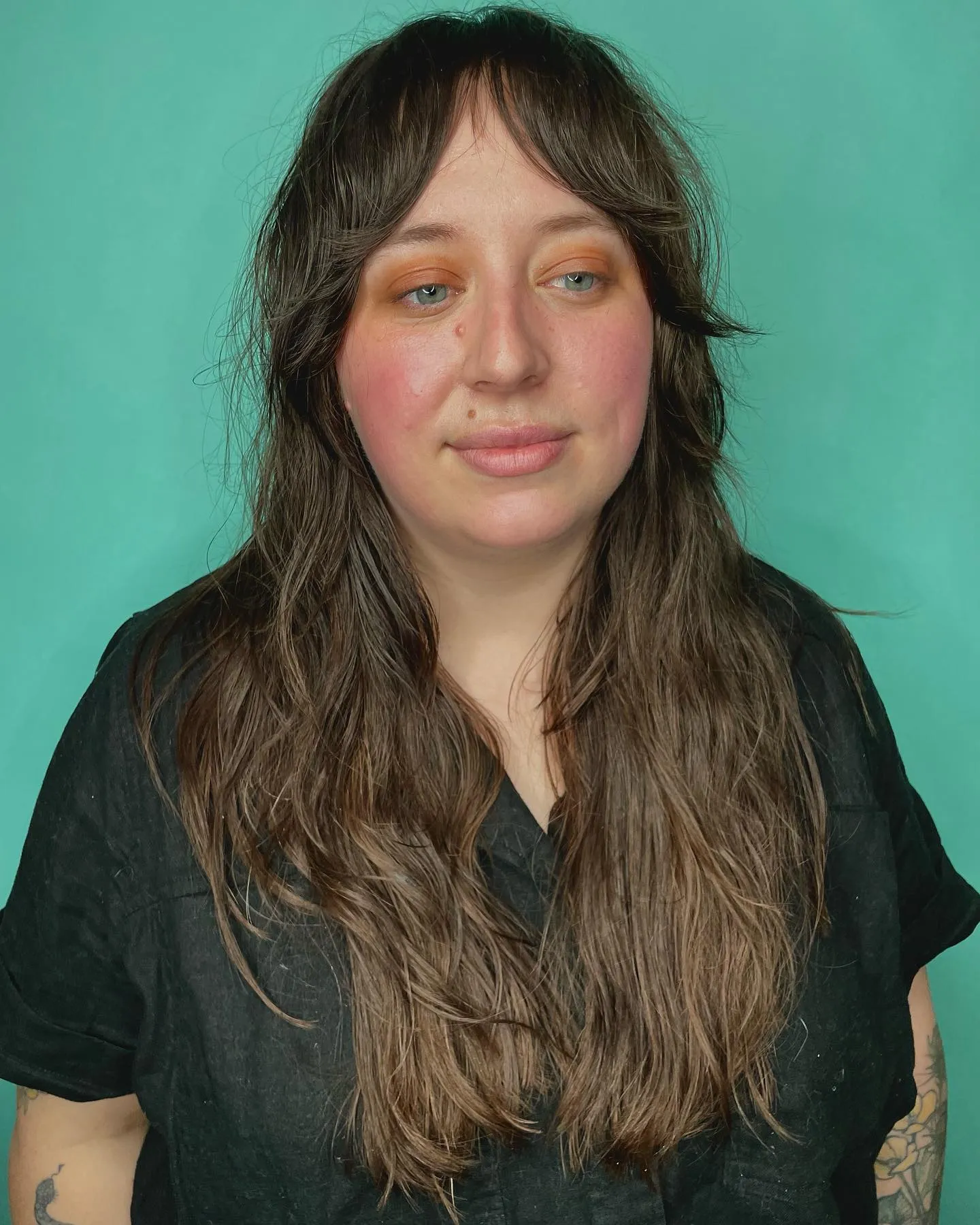 Extra-long shag with wispy curtain fringe and soft wavy layers