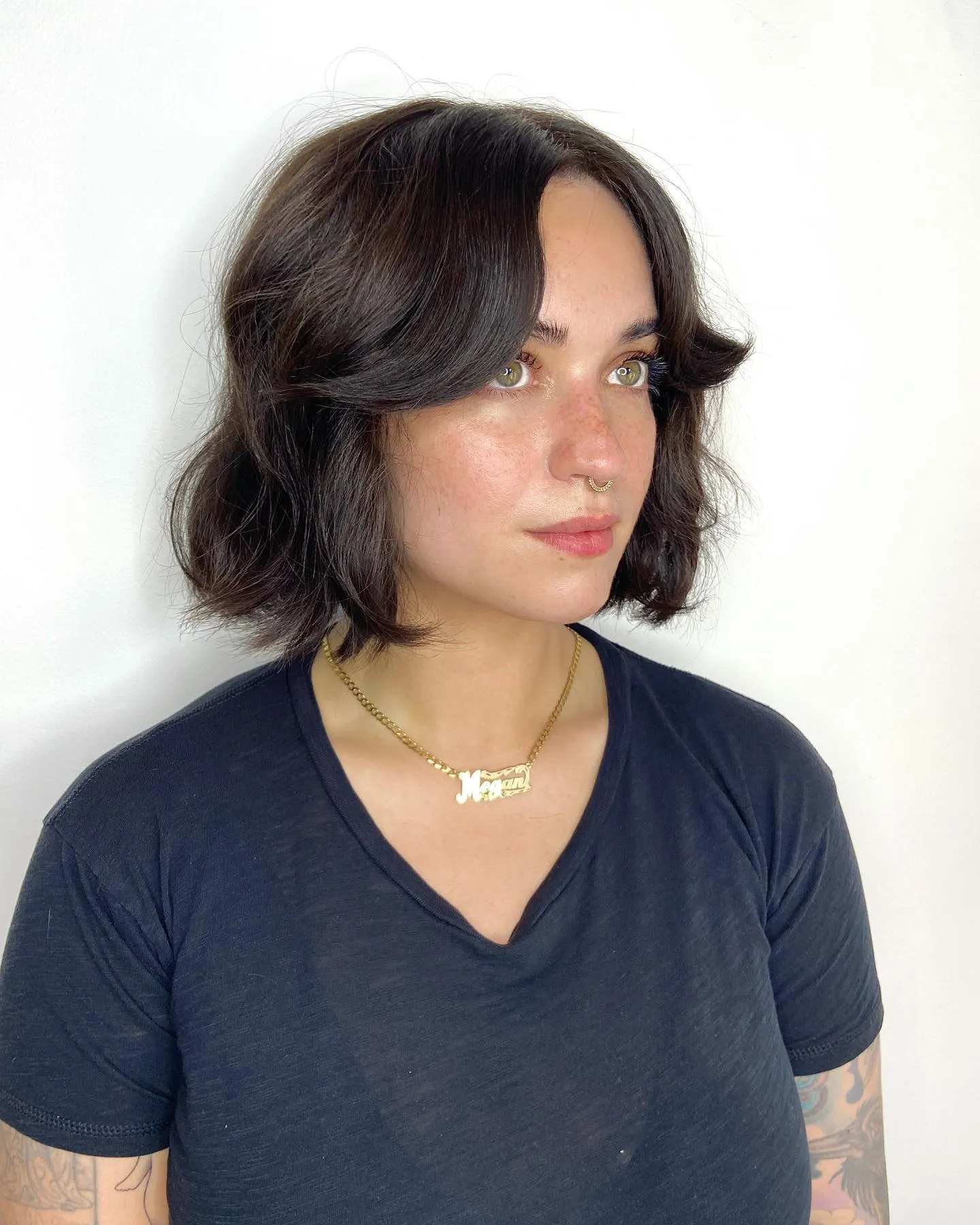 Wavy short bob with full curtain fringe and soft jaw-length layers