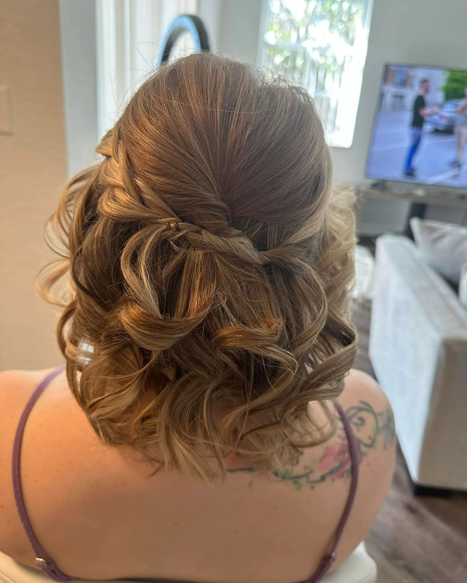 voluminous half-up short bridal bob with soft twists
