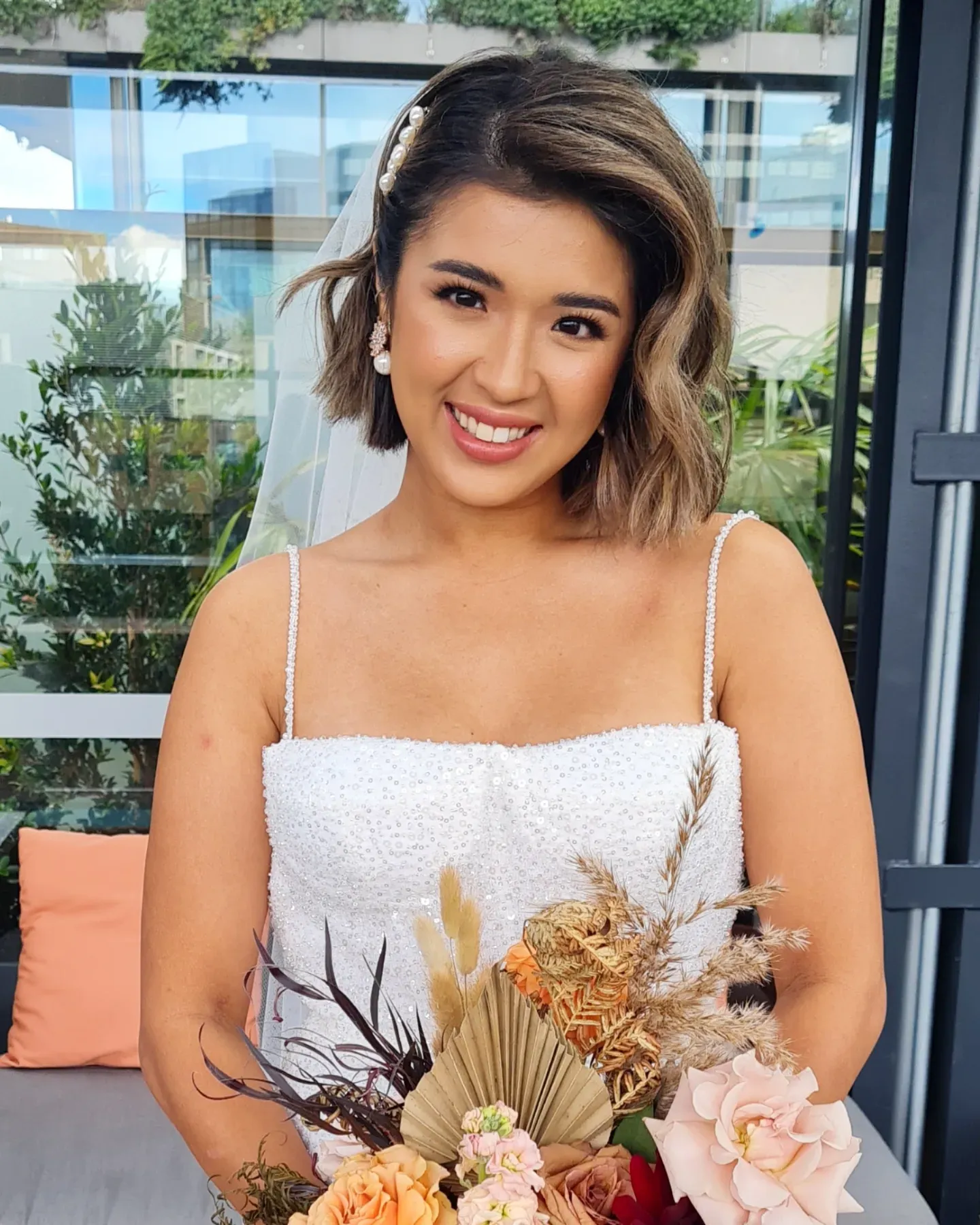sleek chin-length bridal bob with side part