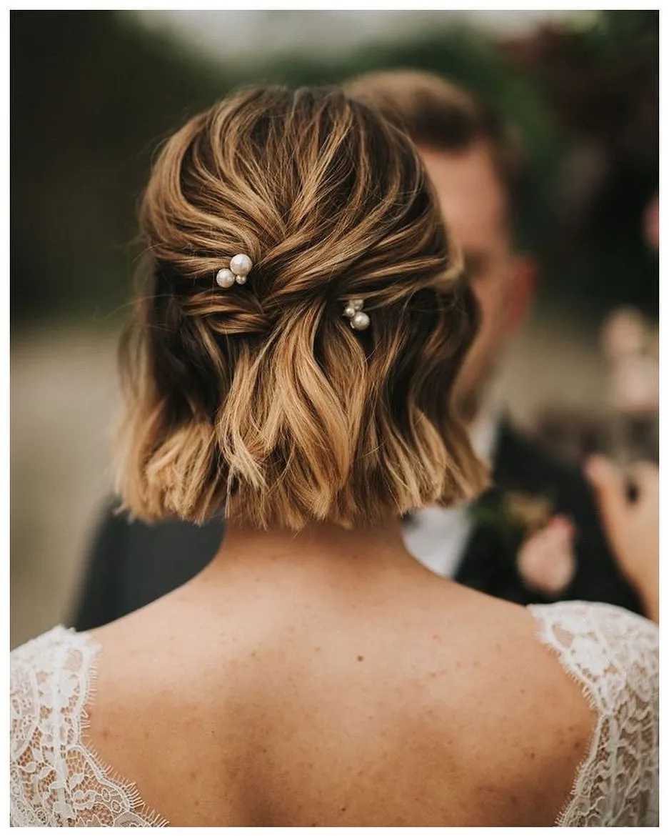 twisted half-up bridal bob with pearl pins