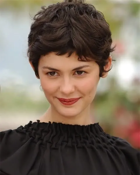 Short textured dark pixie with soft fringe