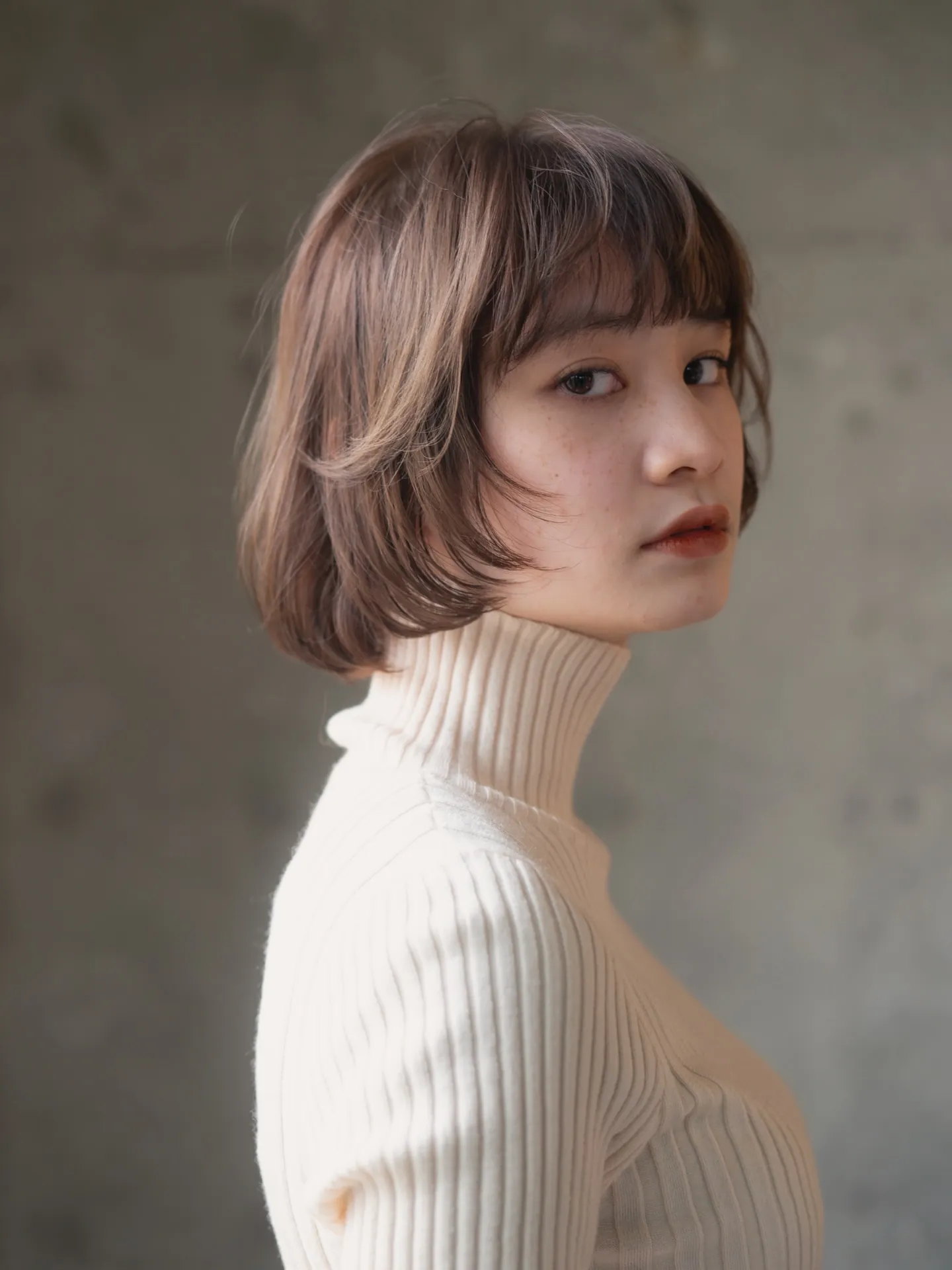 Rounded brown bob with short bangs